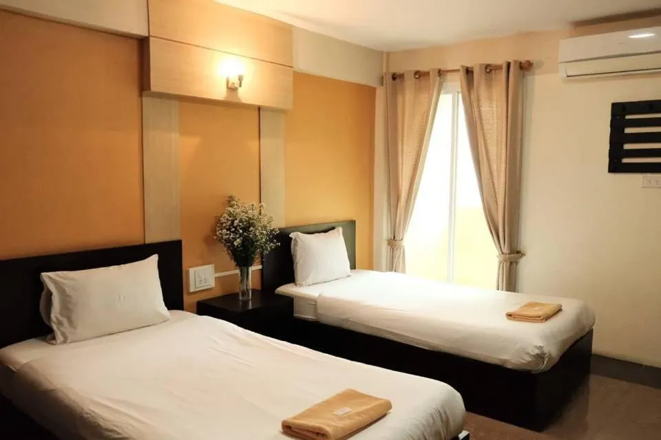 Bed in Puangpech Place