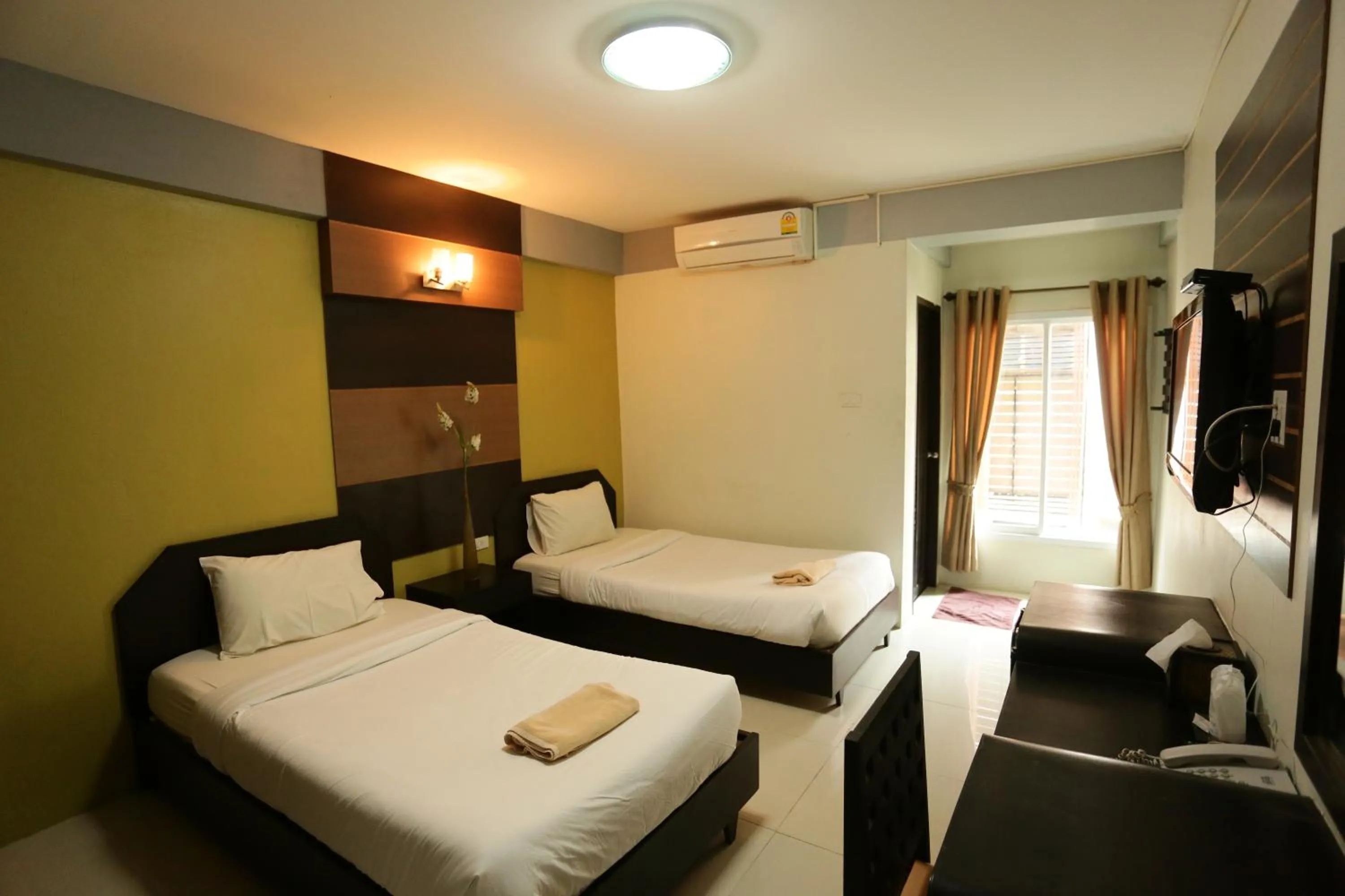 Bed in Puangpech Place