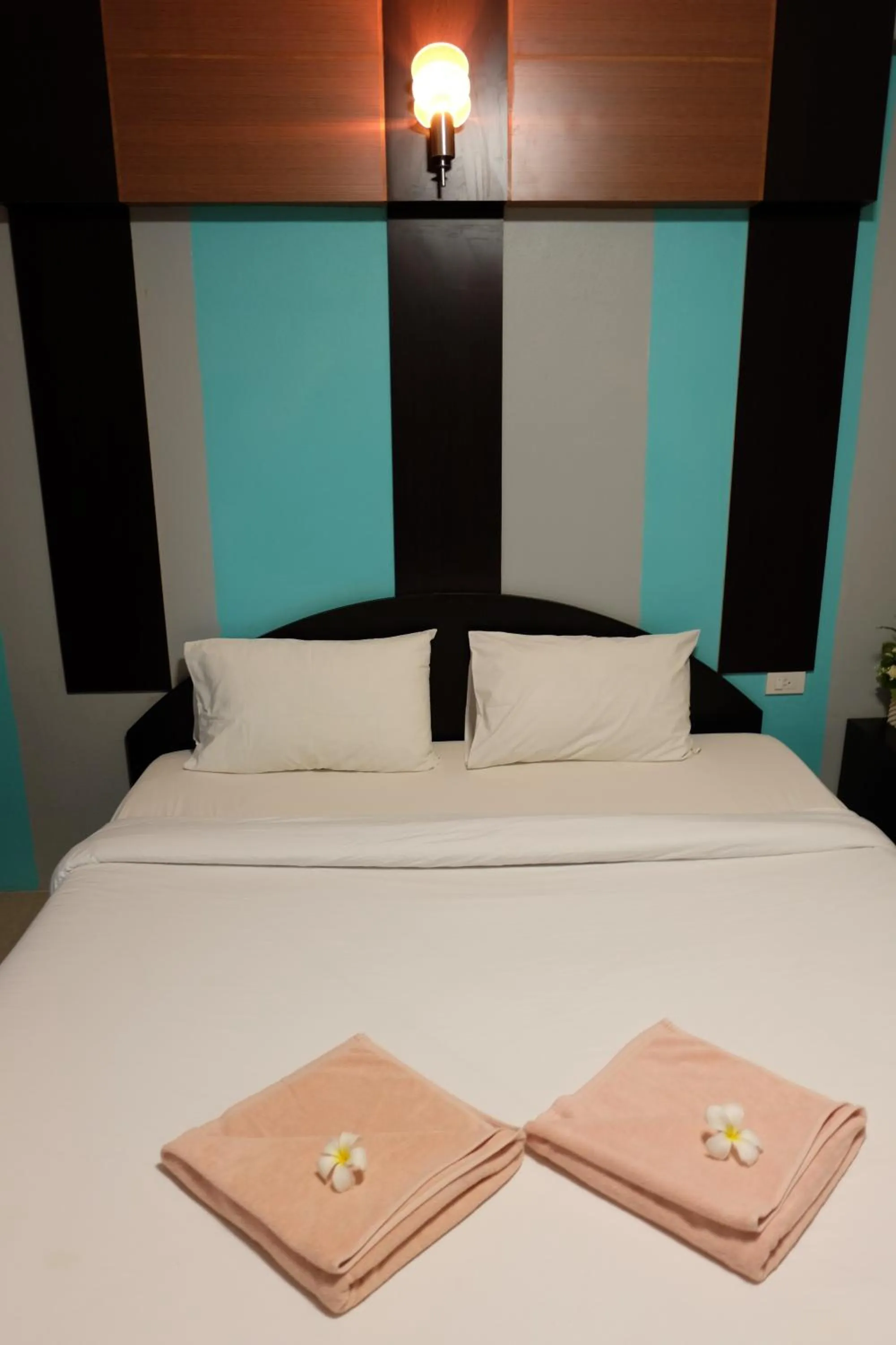 Bed in Puangpech Place