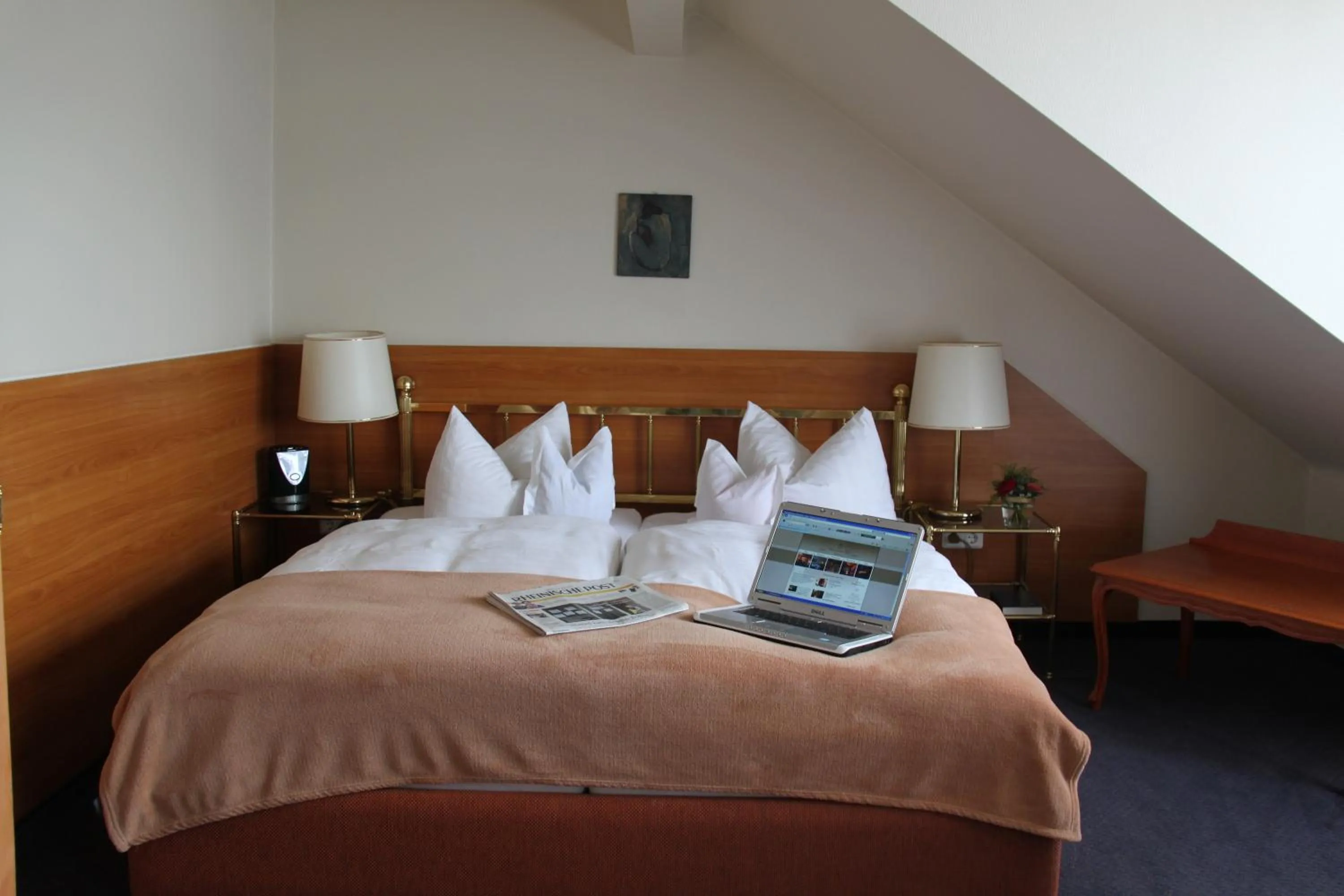 Bed in Hotel Rheinischer Hof