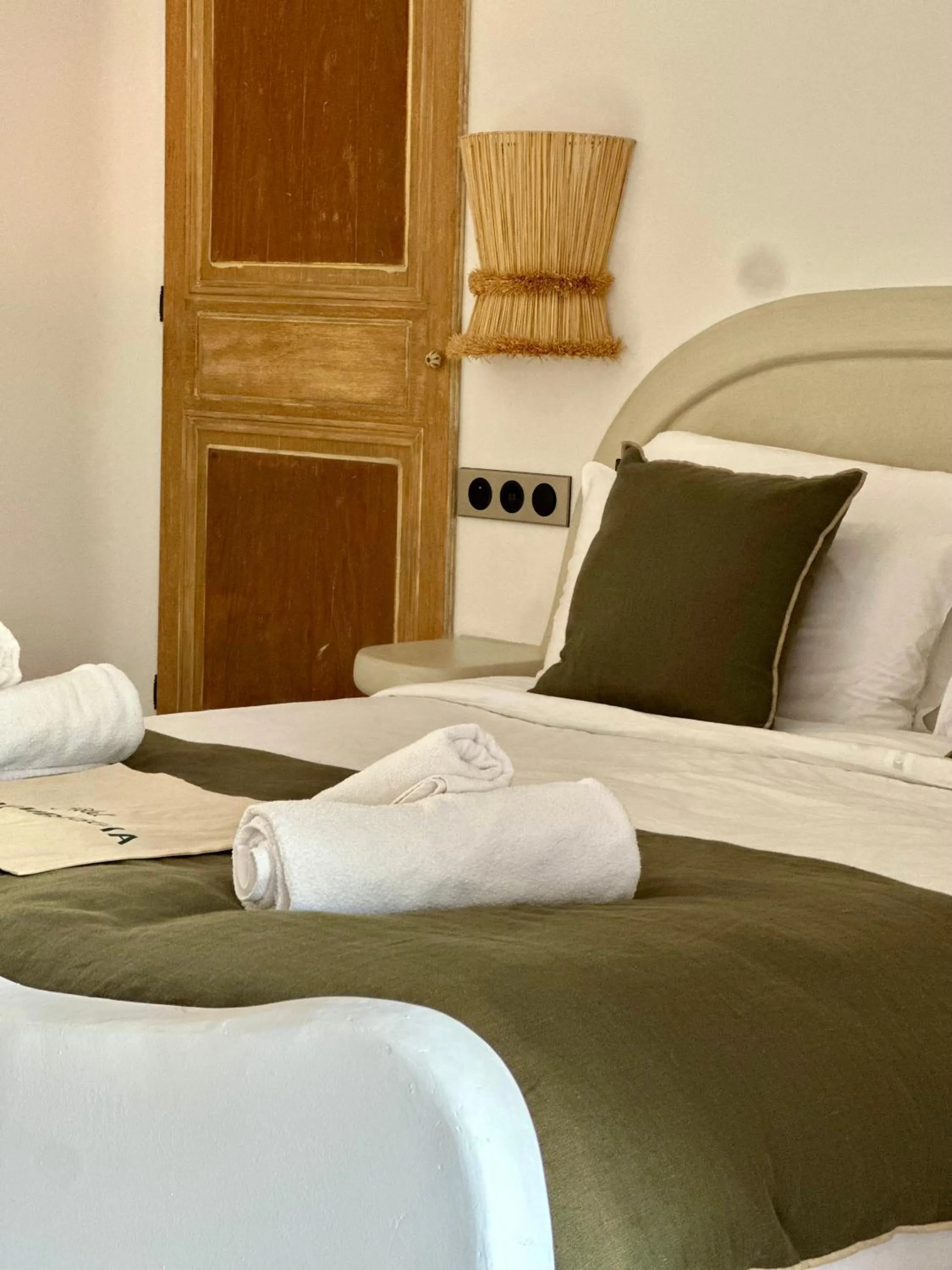 Bed in Hôtel Palombaggia