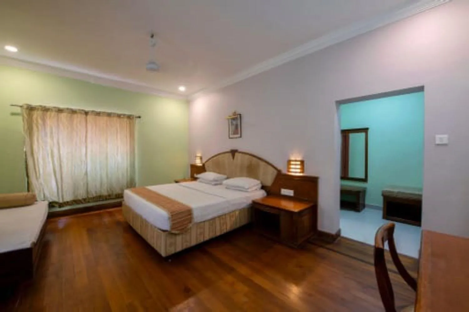 Bedroom, Bed in KTDC Aranya Nivas