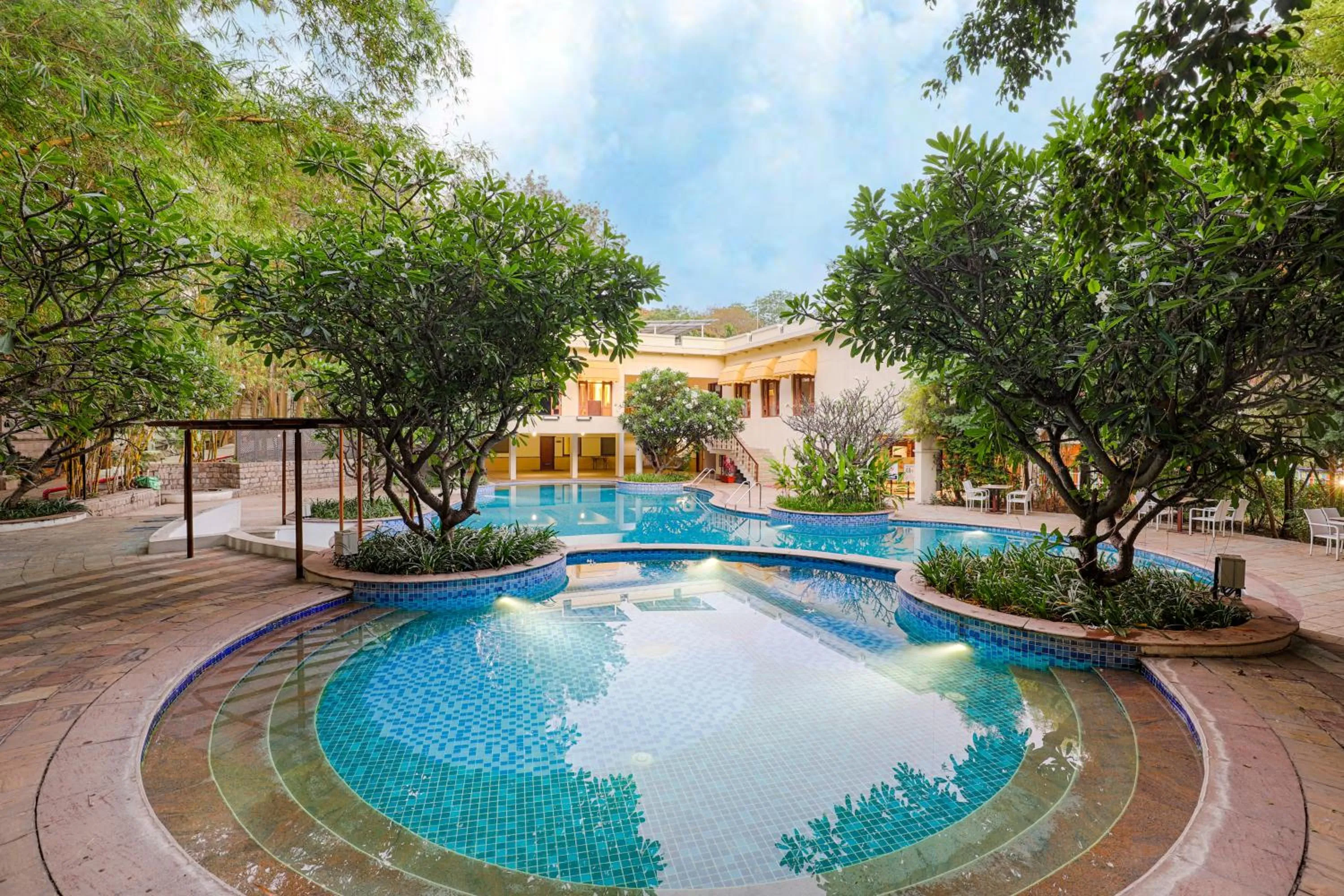 Swimming pool in Club Mahindra Golden Landmark, Mysuru