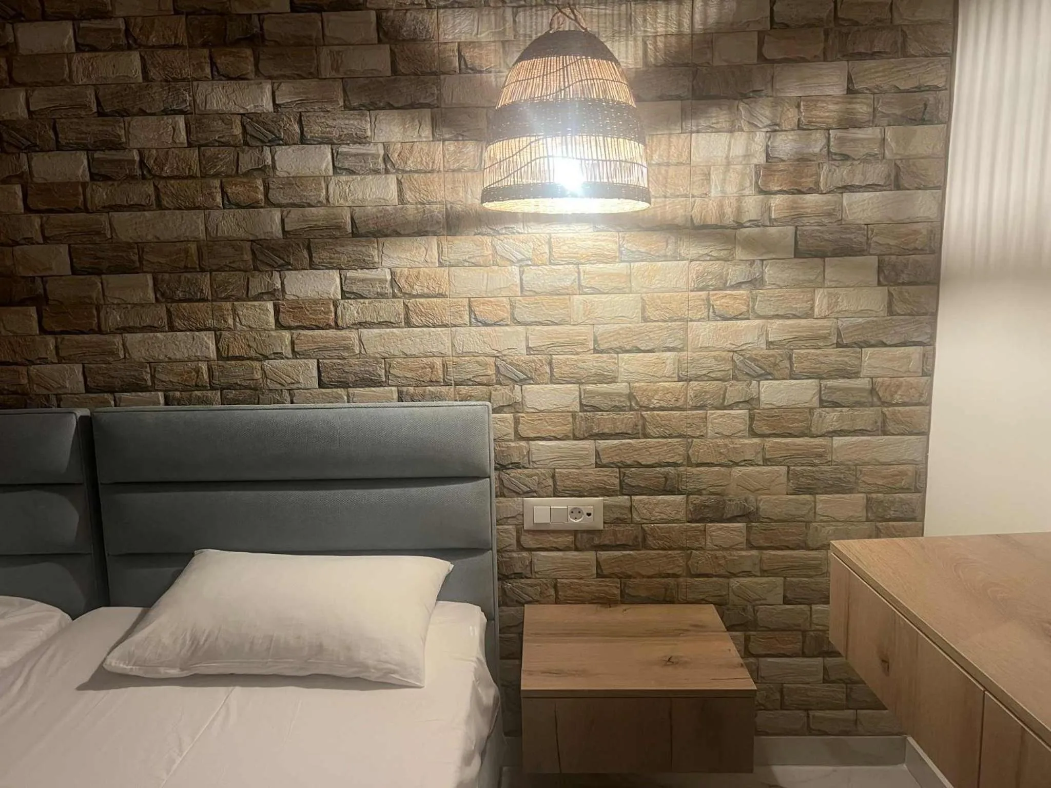 Bed in Dolphin Hotel Apartments