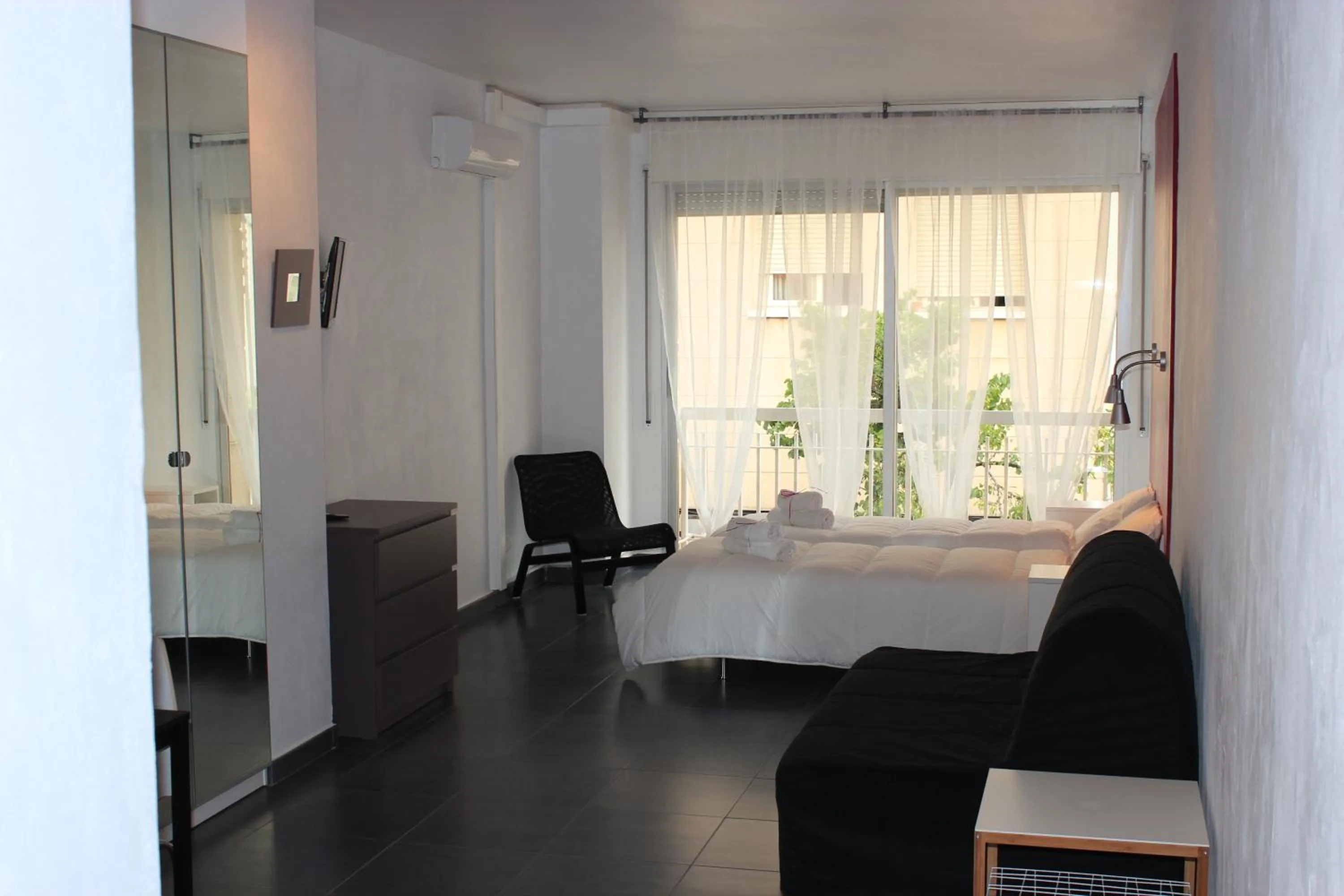 Living room, Bed in Villa Sagrada