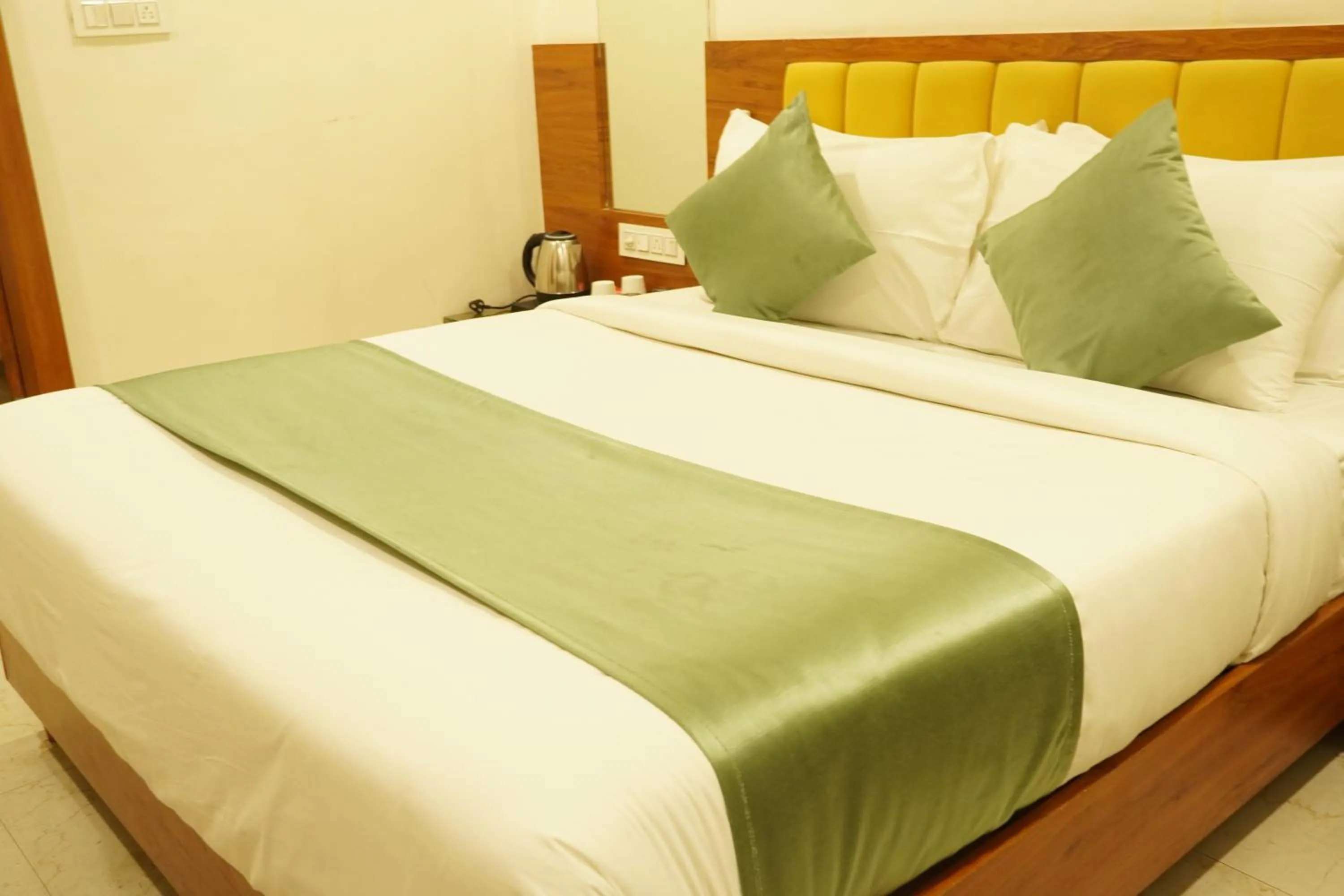 Bed in Hotel Heera Residency