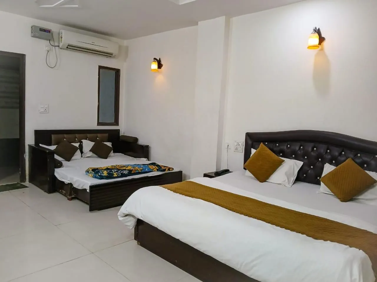 Bed in Krishna Cottage, Vrindavan