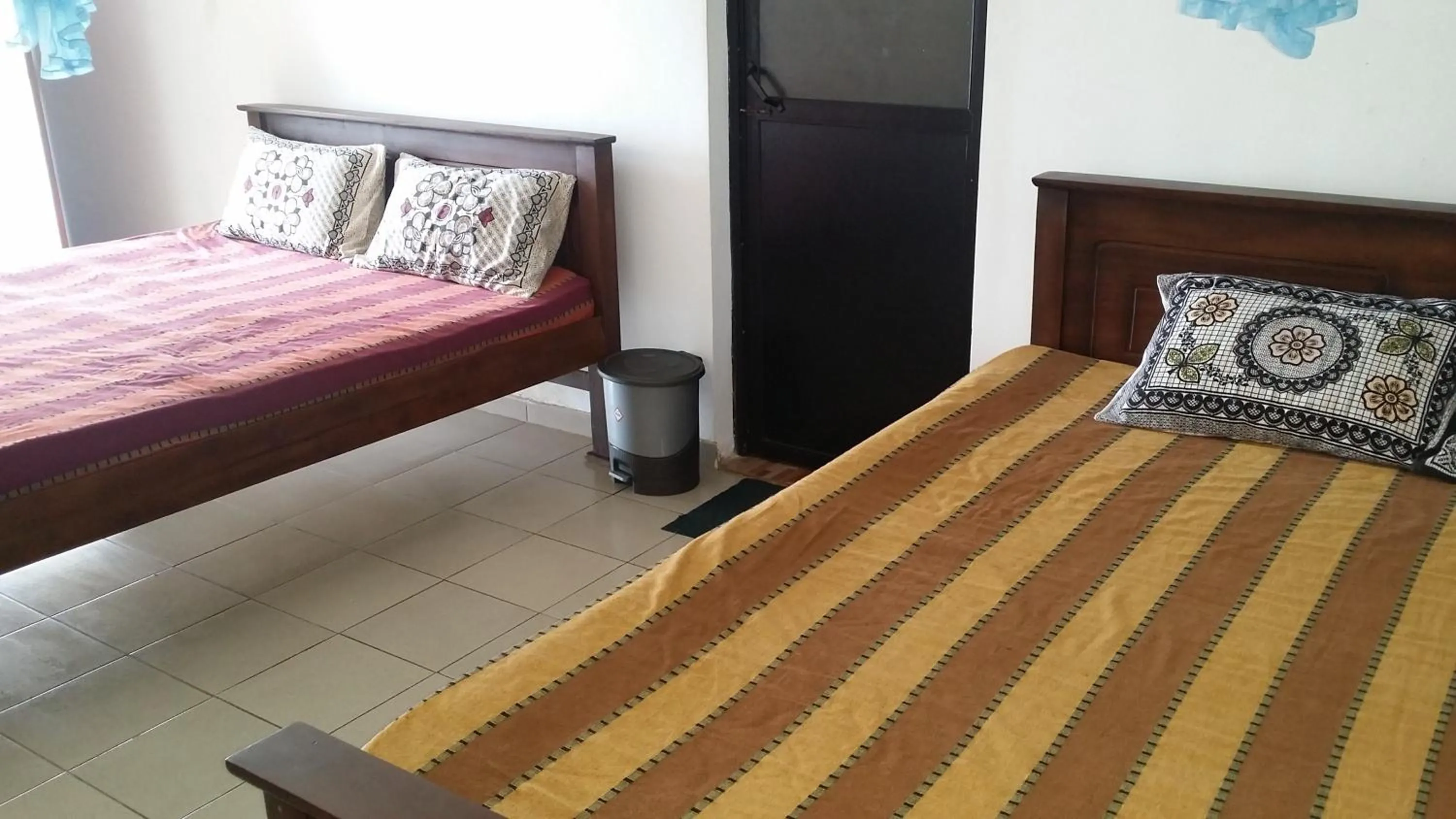 Bed in Polhena Coral Reef Resort