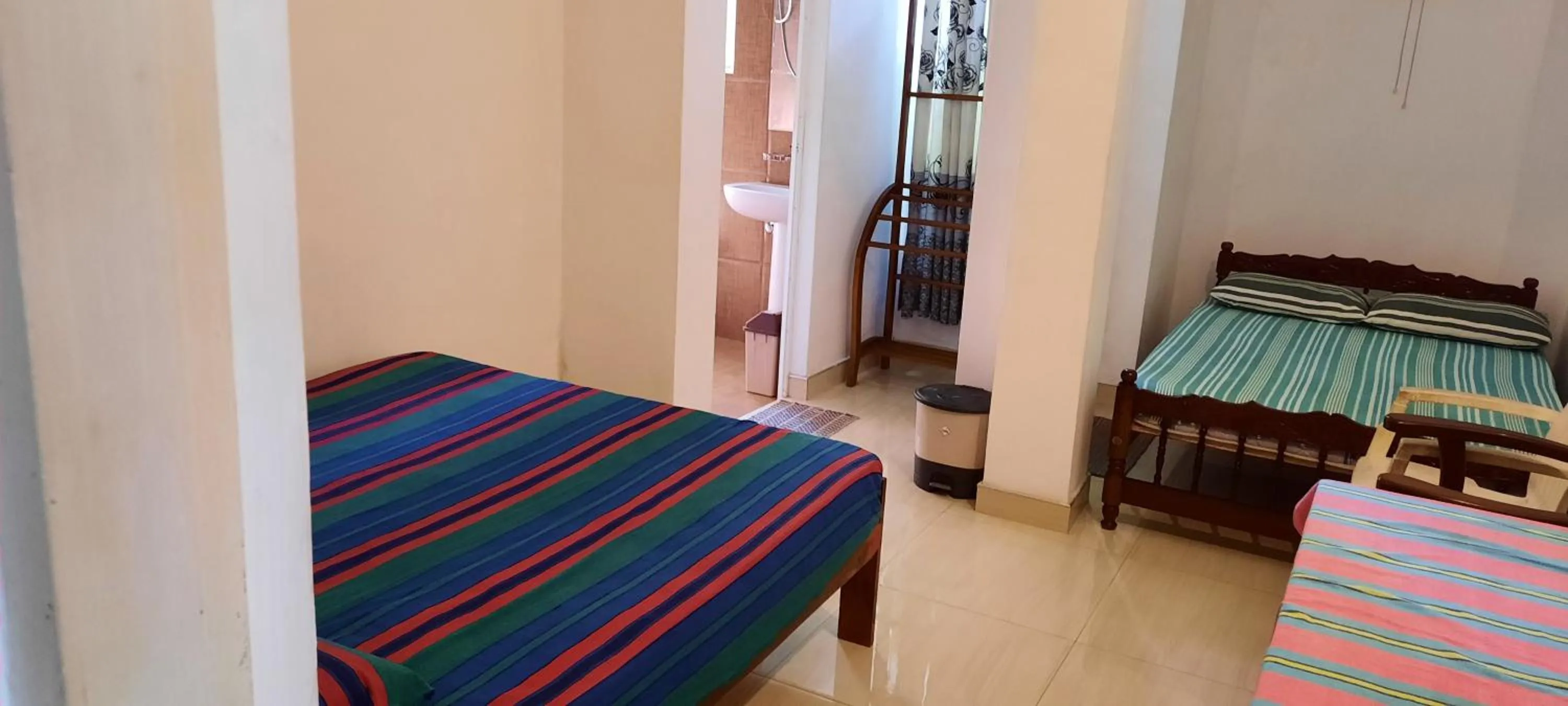 Bed in Polhena Coral Reef Resort