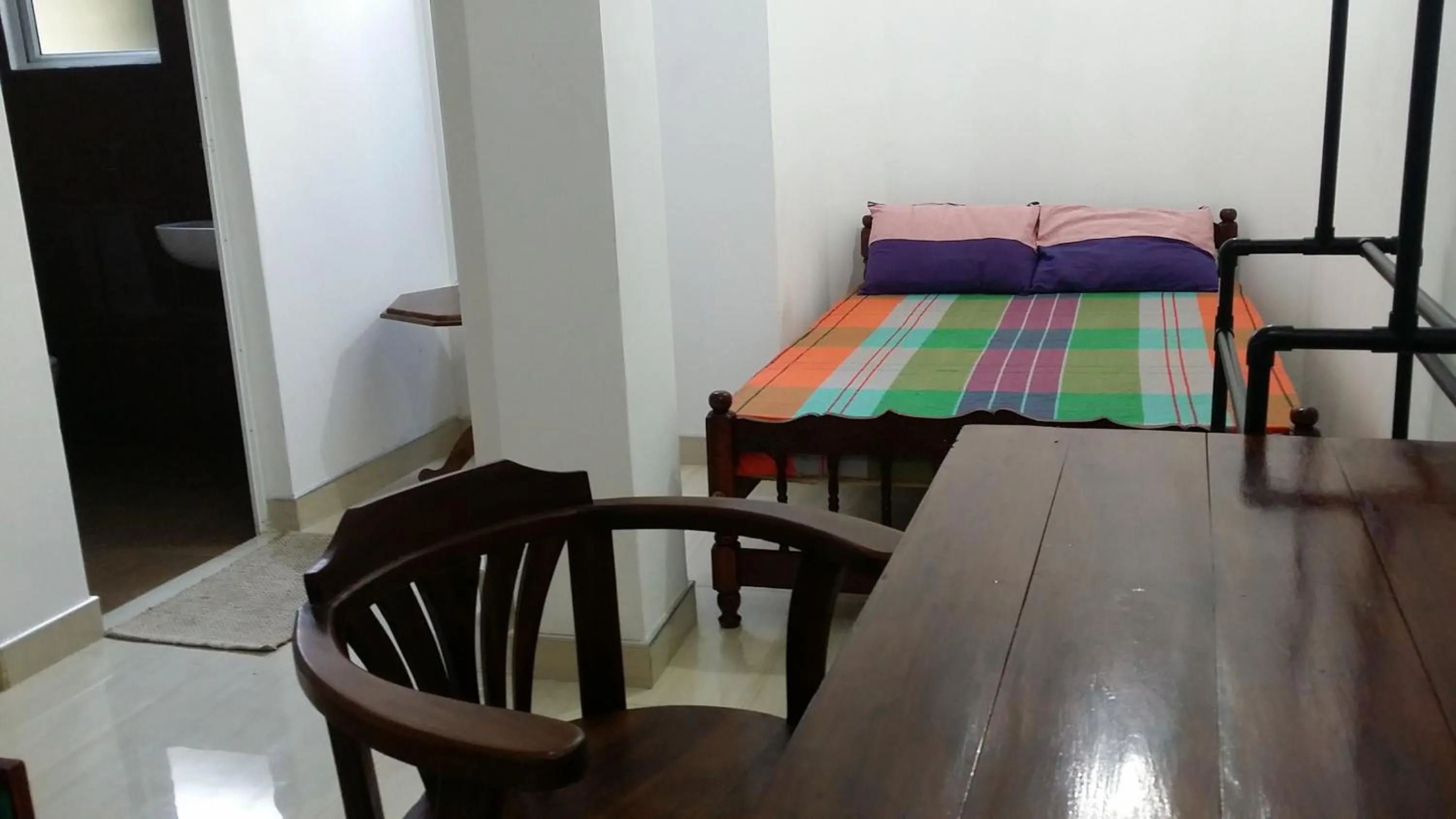 Bed in Polhena Coral Reef Resort