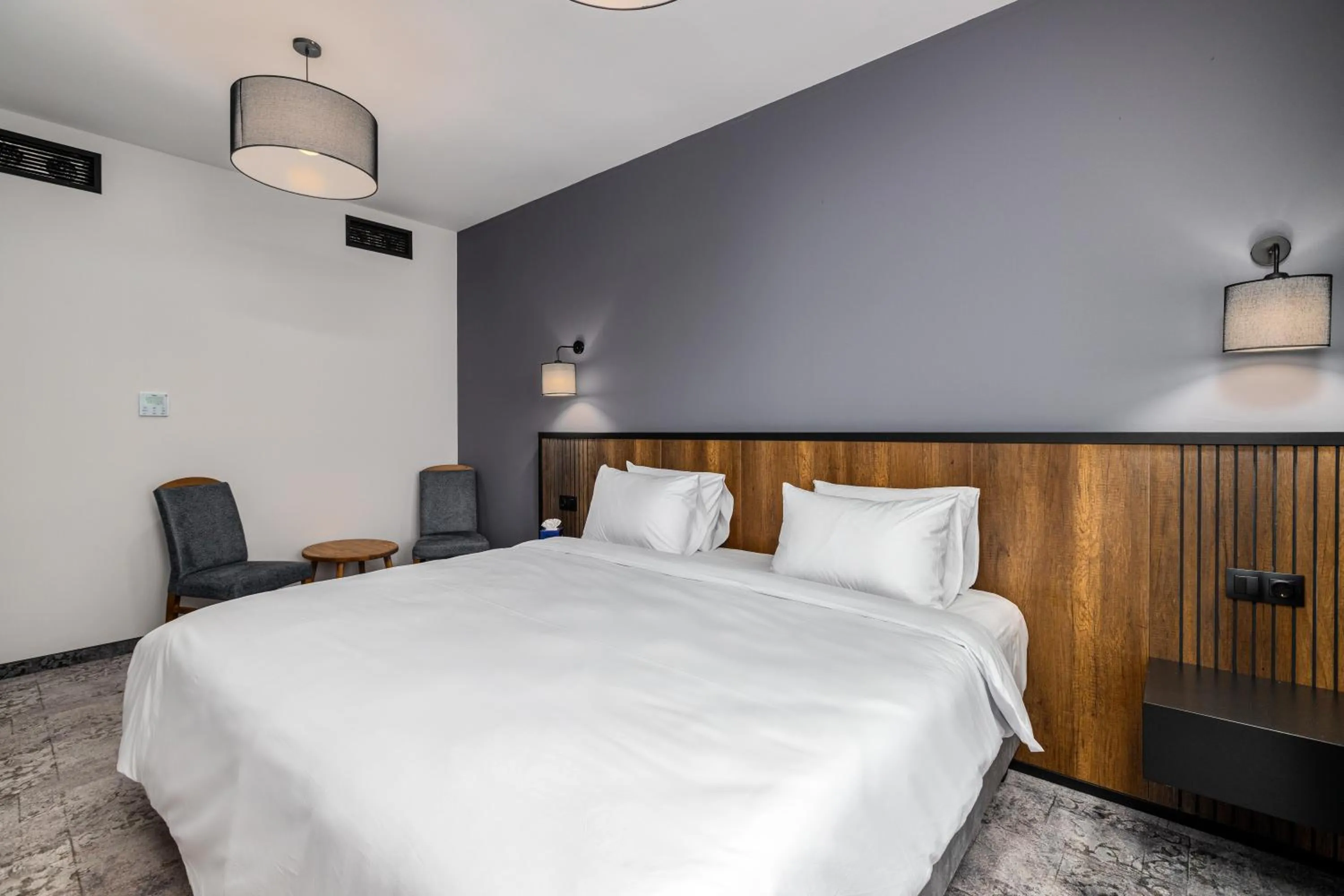 Bed in Hotel Qvevrebi