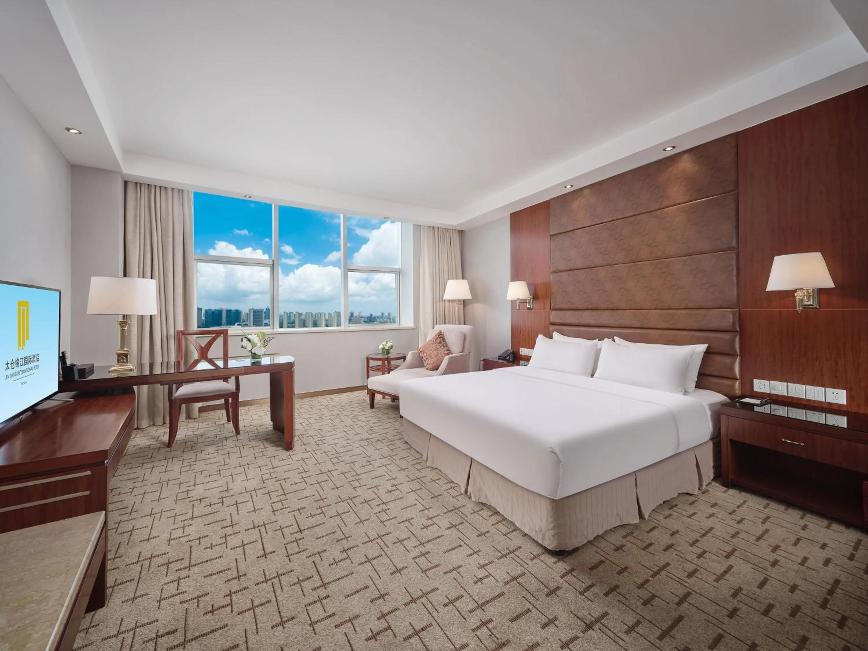 Bed in Jin Jiang International Hotel Taicang