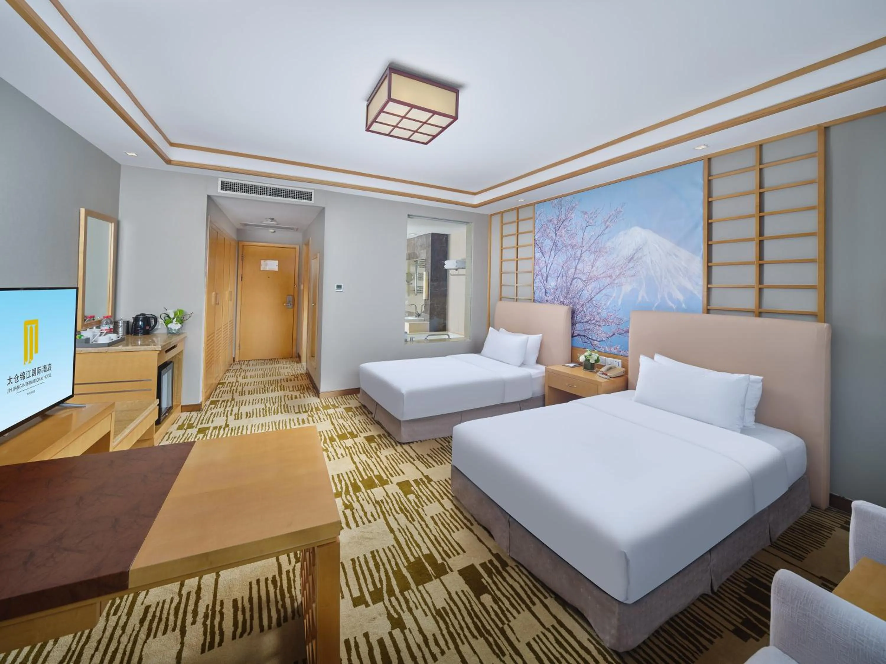 Bed in Jin Jiang International Hotel Taicang