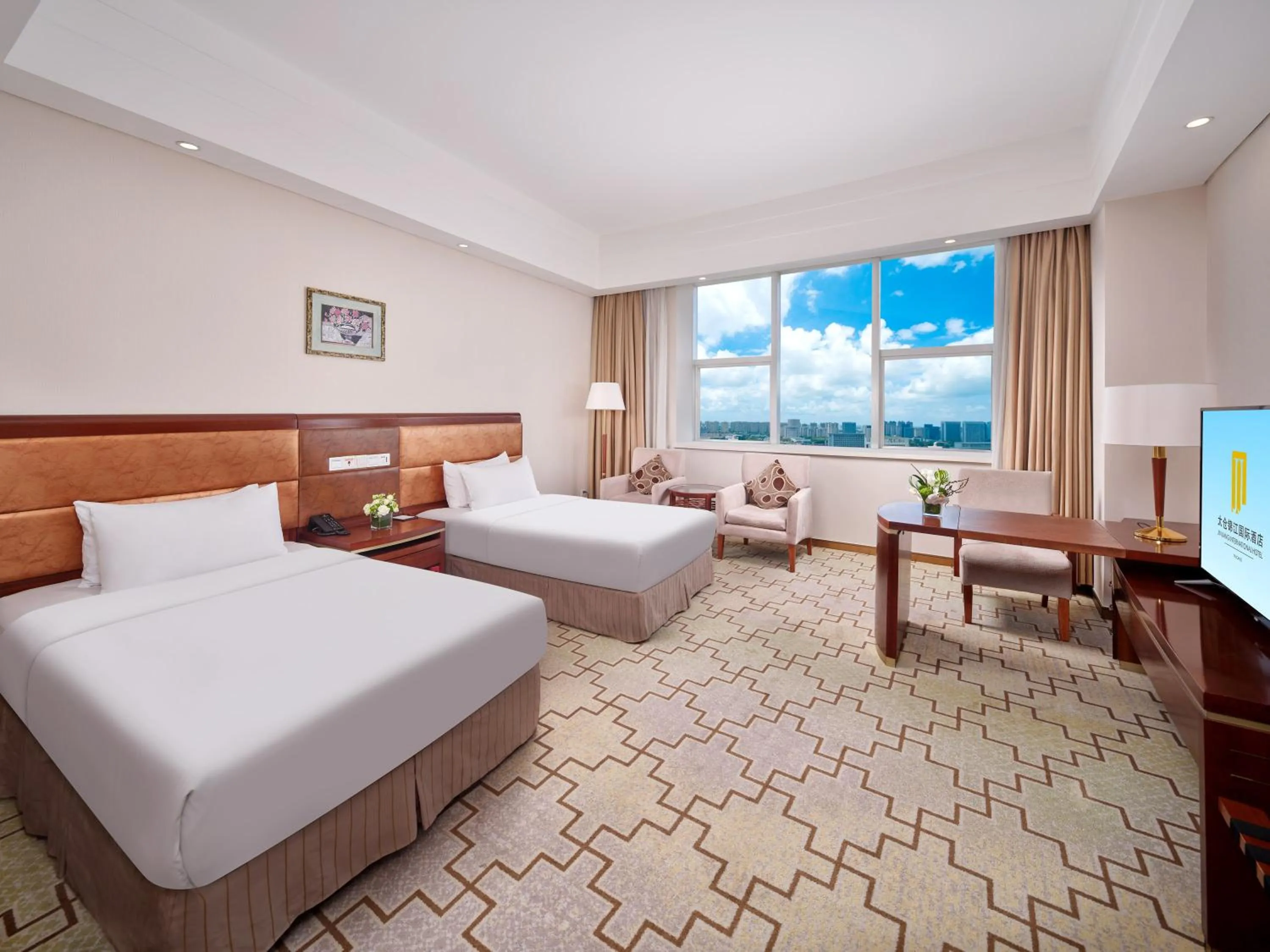 Bed in Jin Jiang International Hotel Taicang