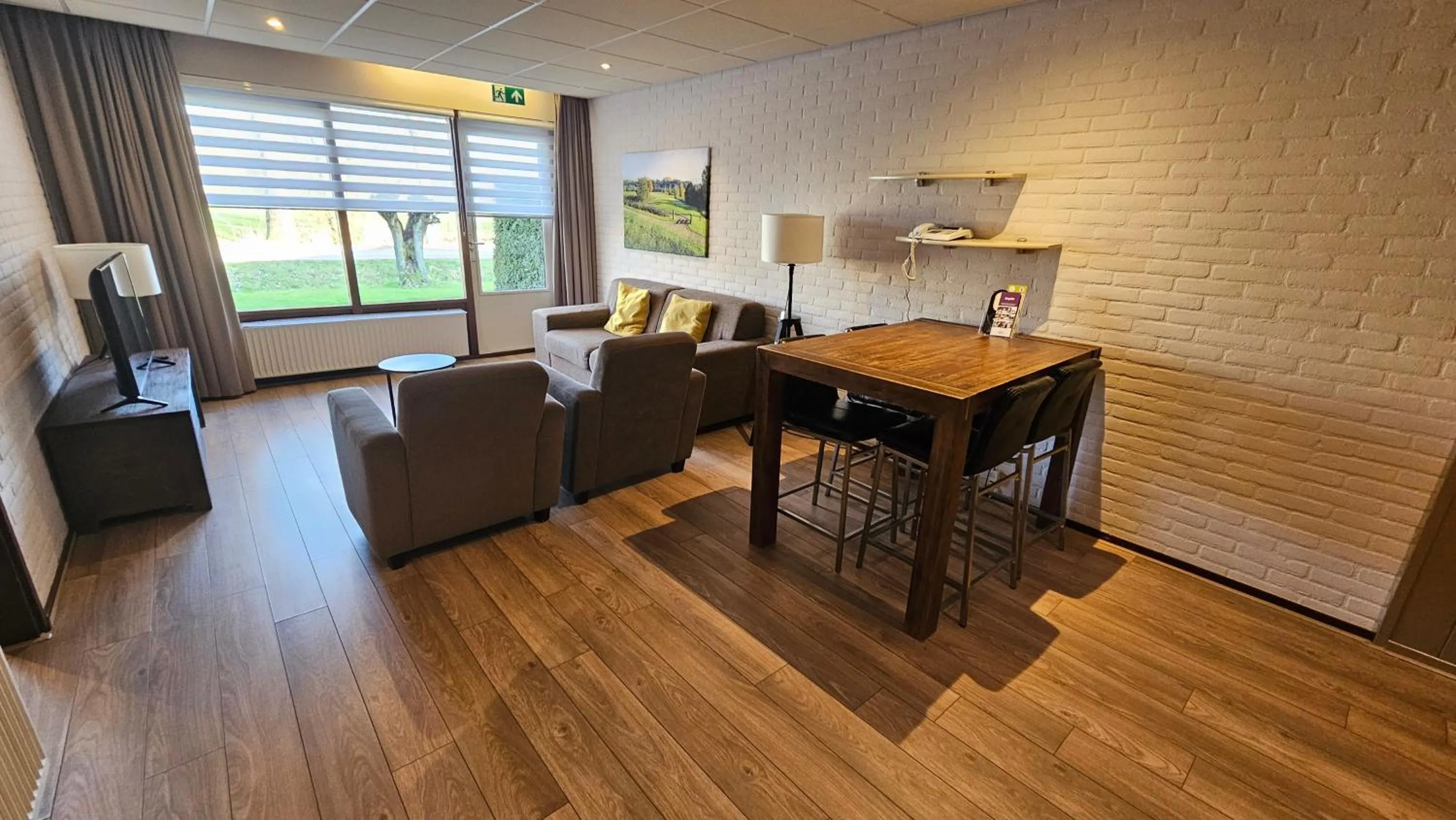 Living room in Aparthotel Delden