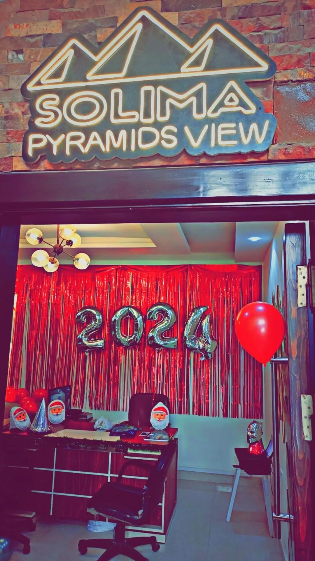 Property logo or sign in Solima Pyramids View