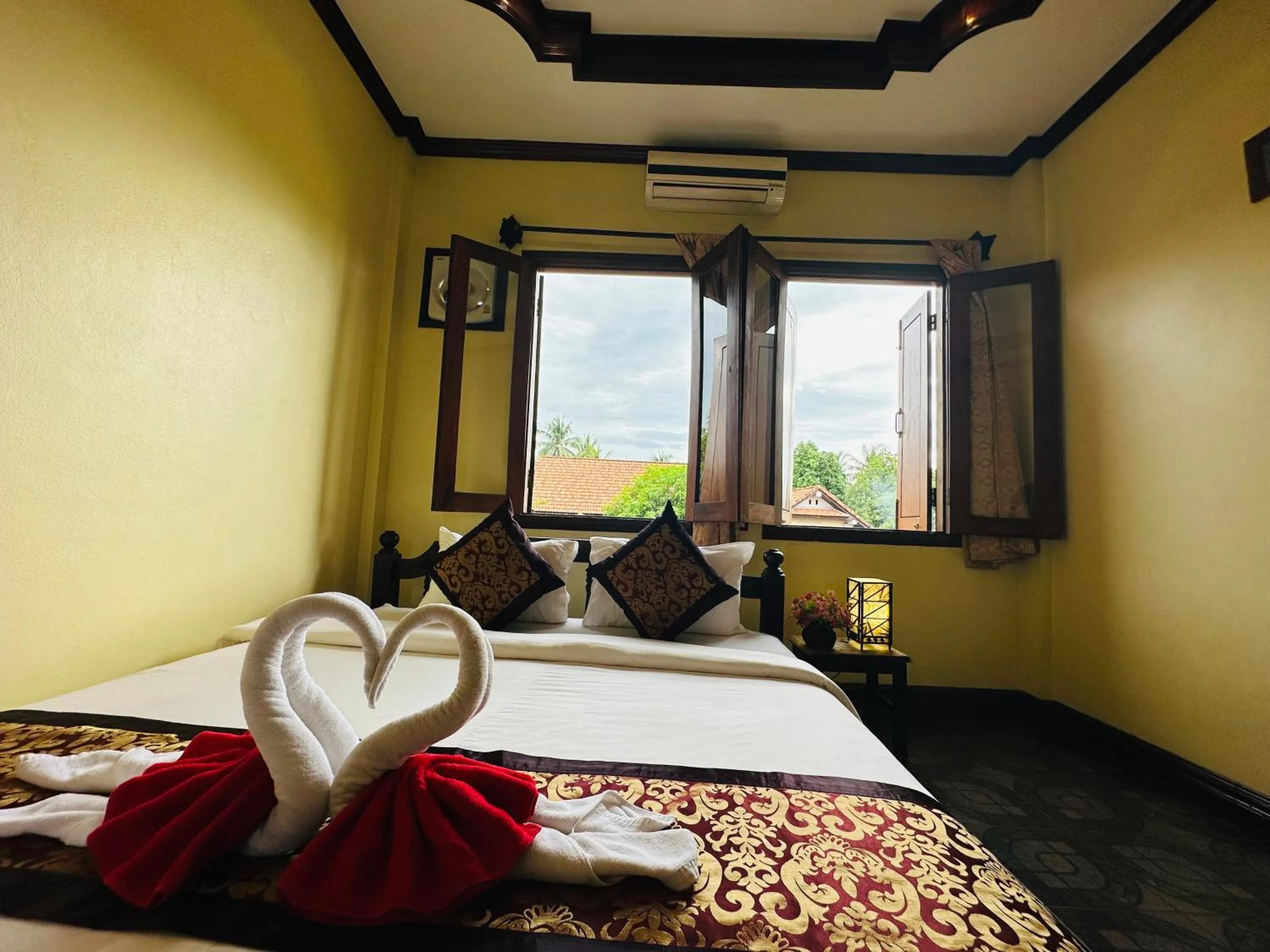 Photo of the whole room, Bed in Visoun Luang Prabang Hotel