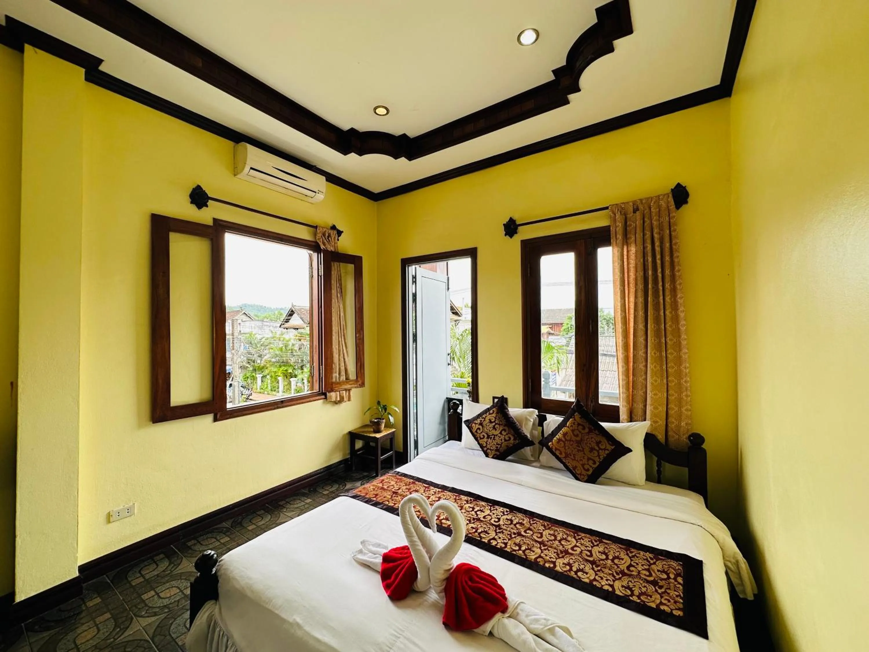 Bed in Visoun Luang Prabang Hotel