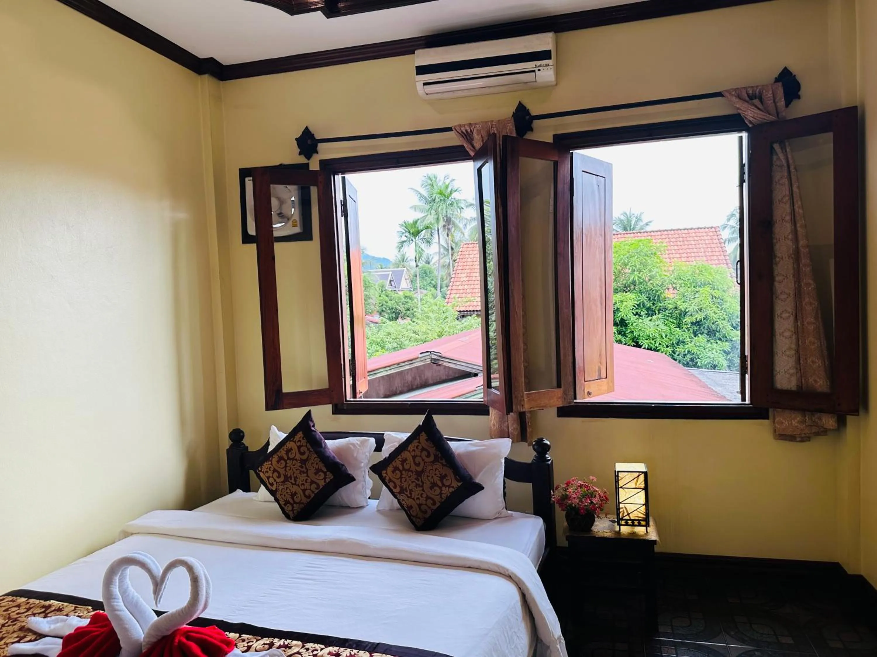 Bed in Visoun Luang Prabang Hotel