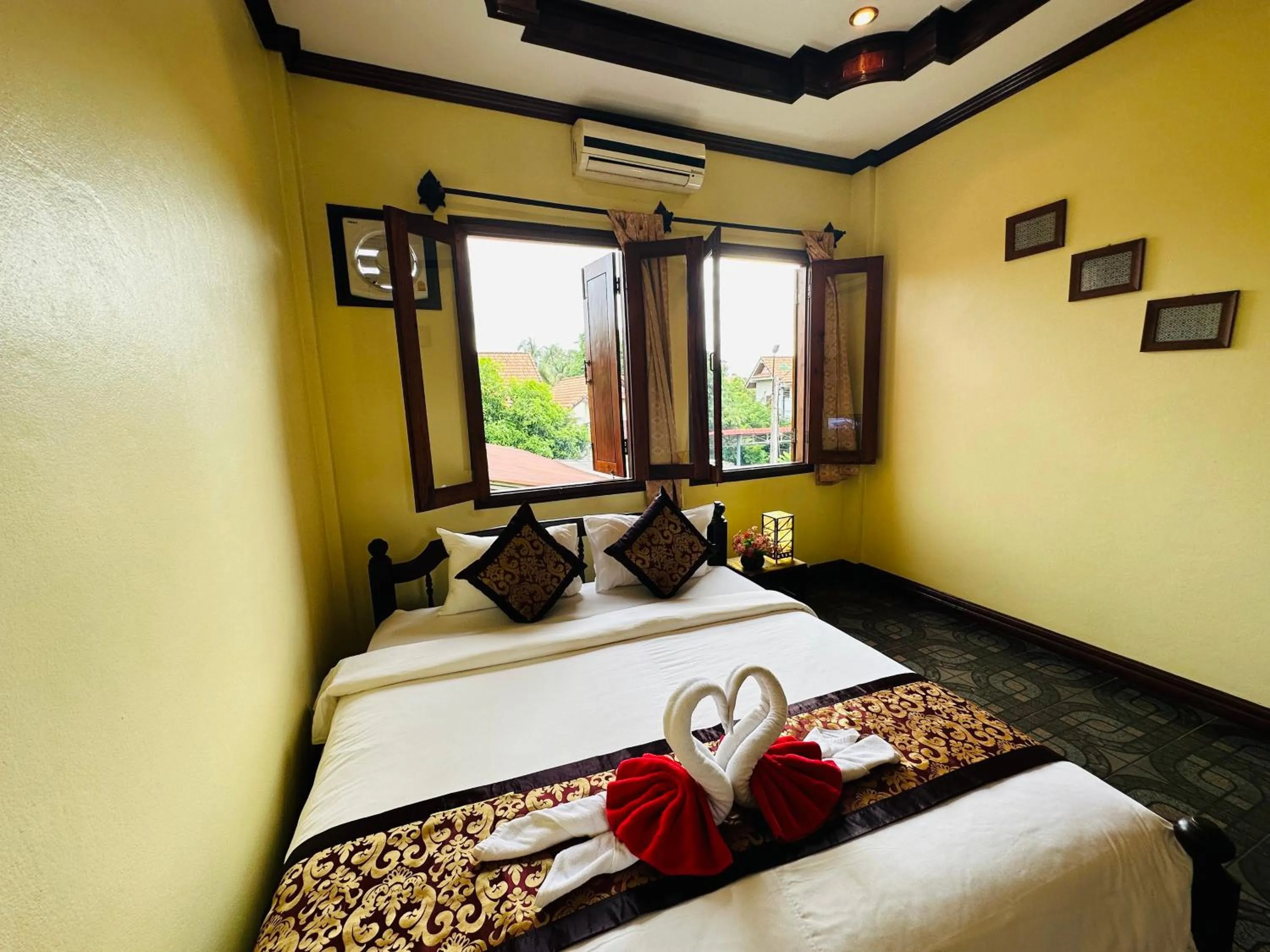 Bed in Visoun Luang Prabang Hotel