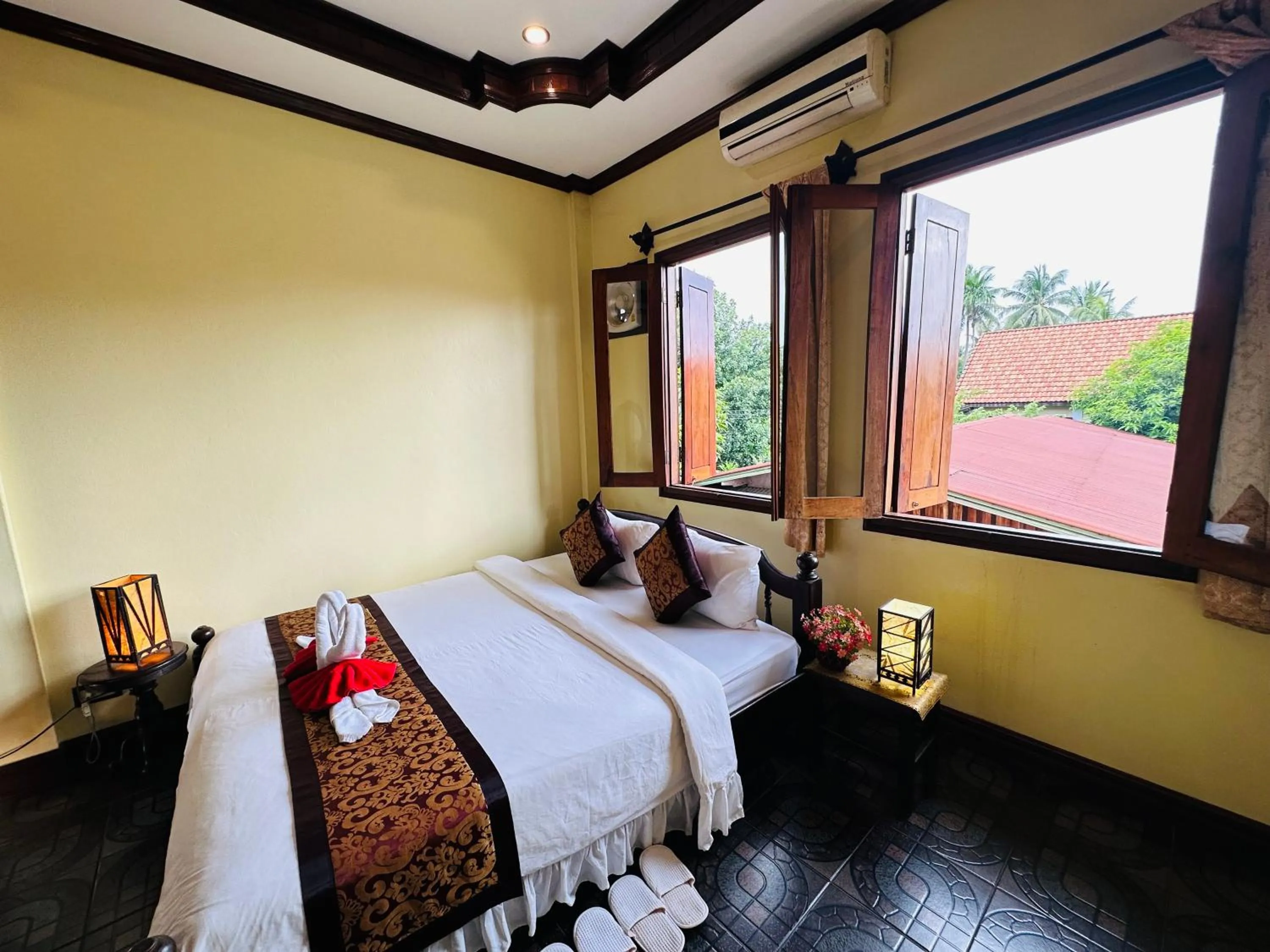 Bed in Visoun Luang Prabang Hotel