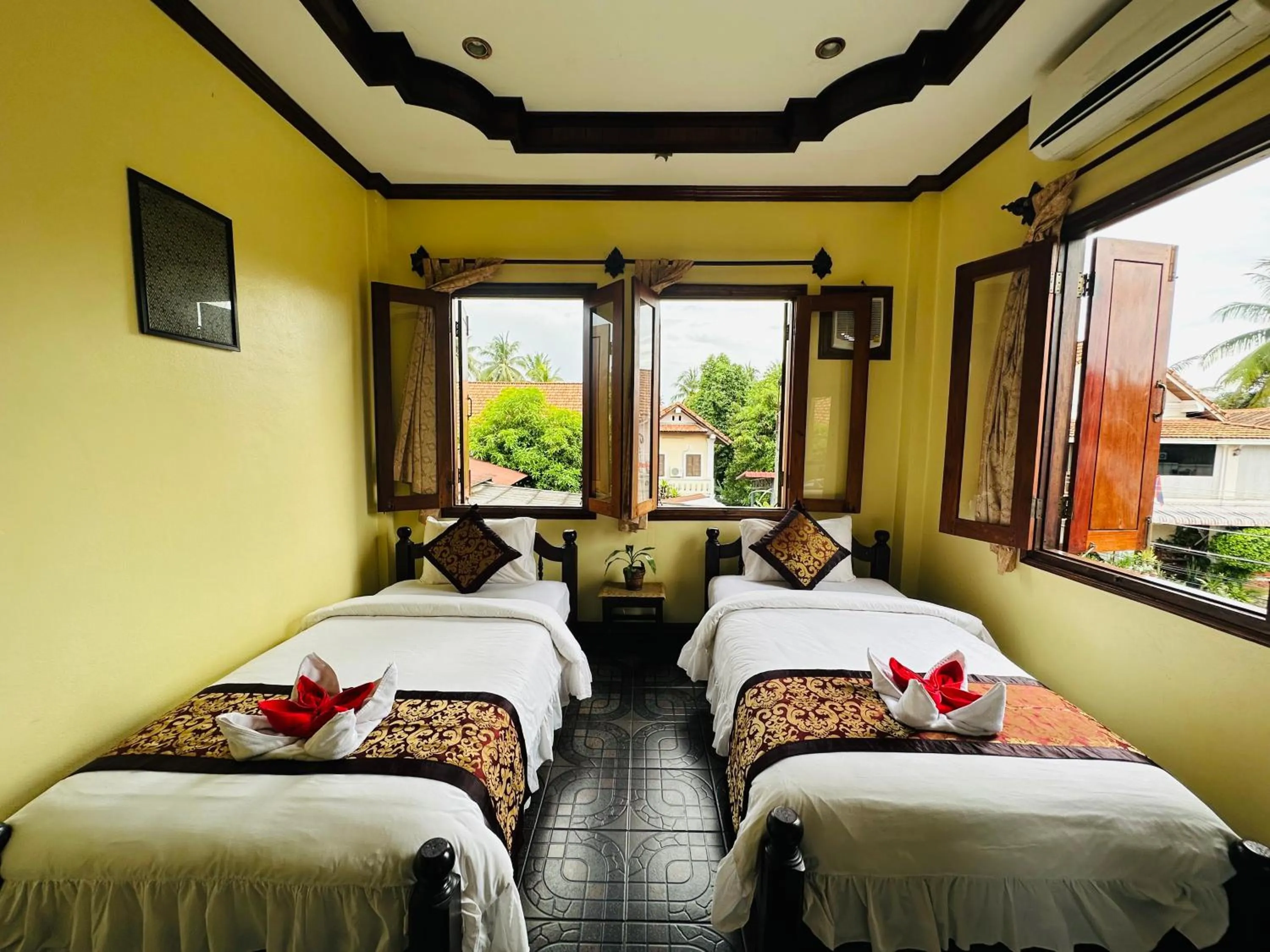 Bed in Visoun Luang Prabang Hotel