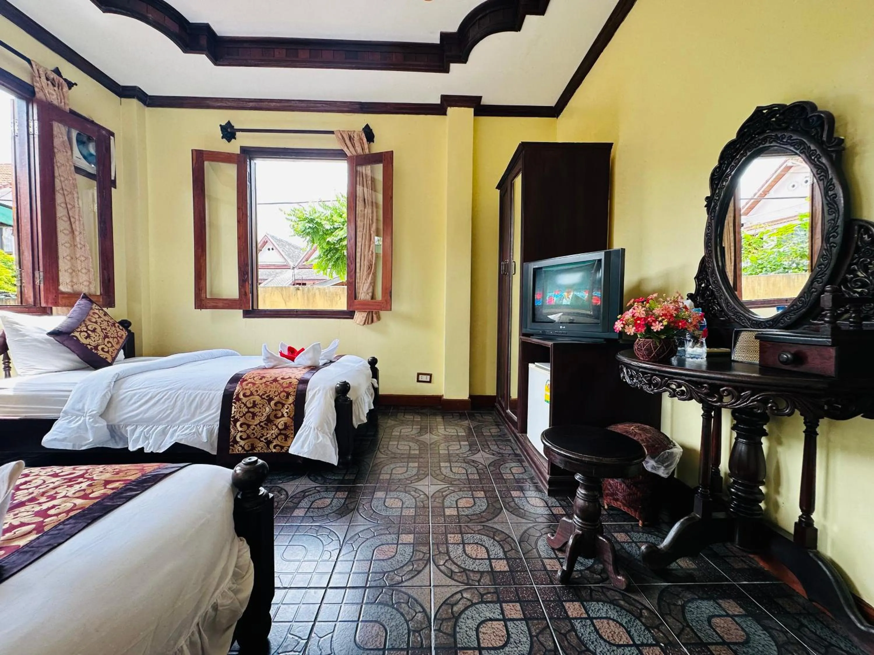 Communal lounge/ TV room, Bed in Visoun Luang Prabang Hotel