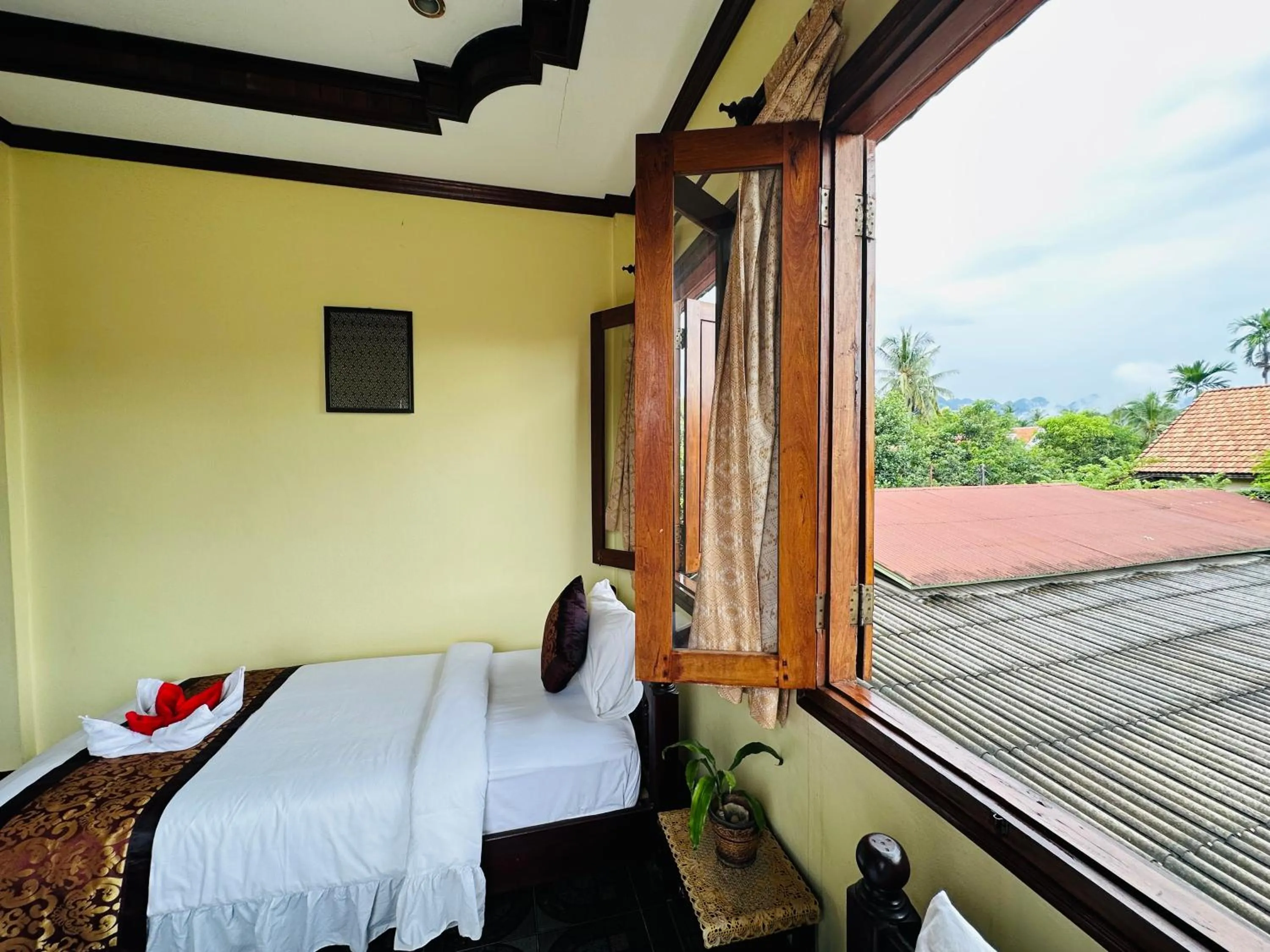 Bed in Visoun Luang Prabang Hotel