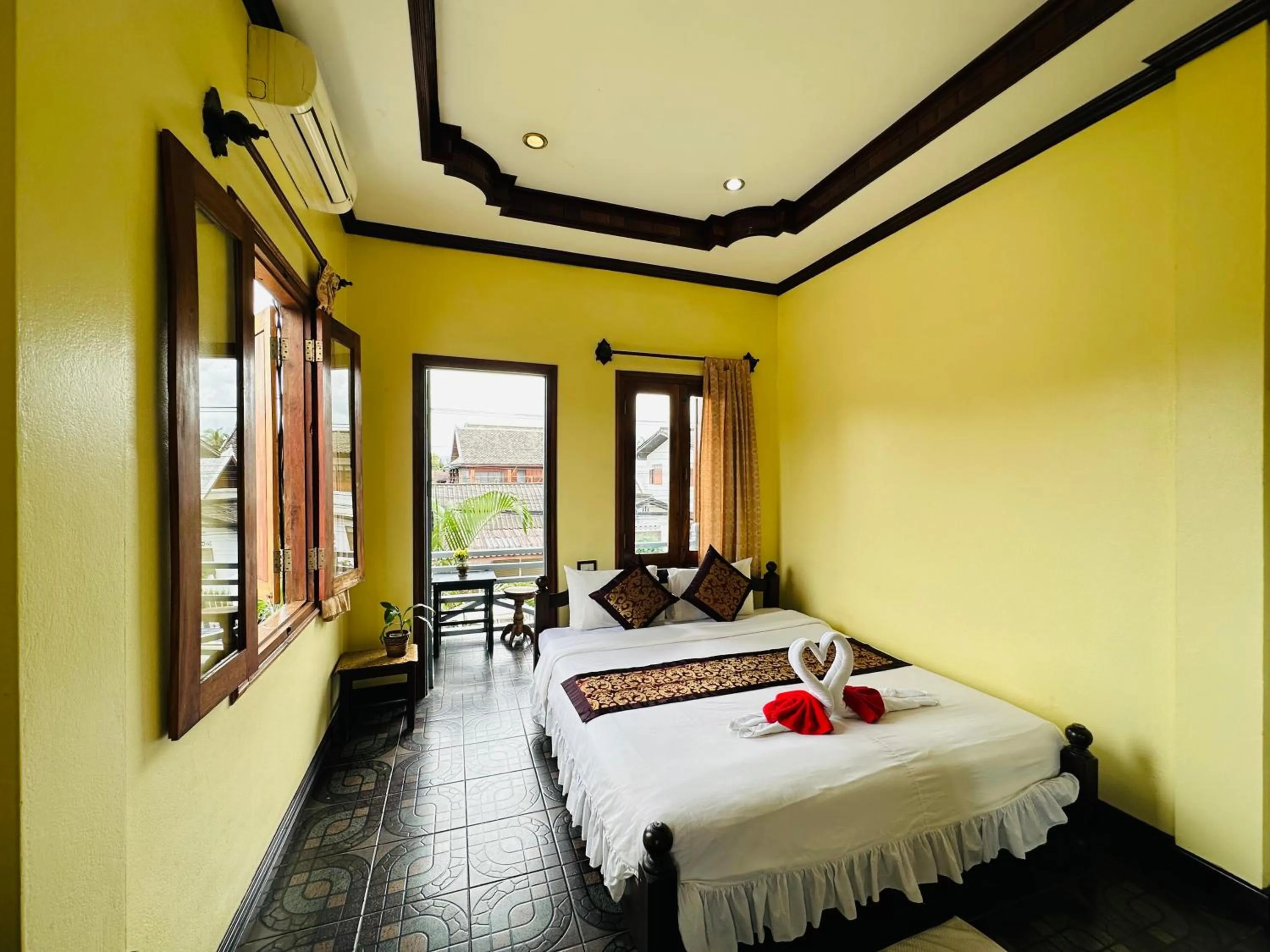 Bed in Visoun Luang Prabang Hotel