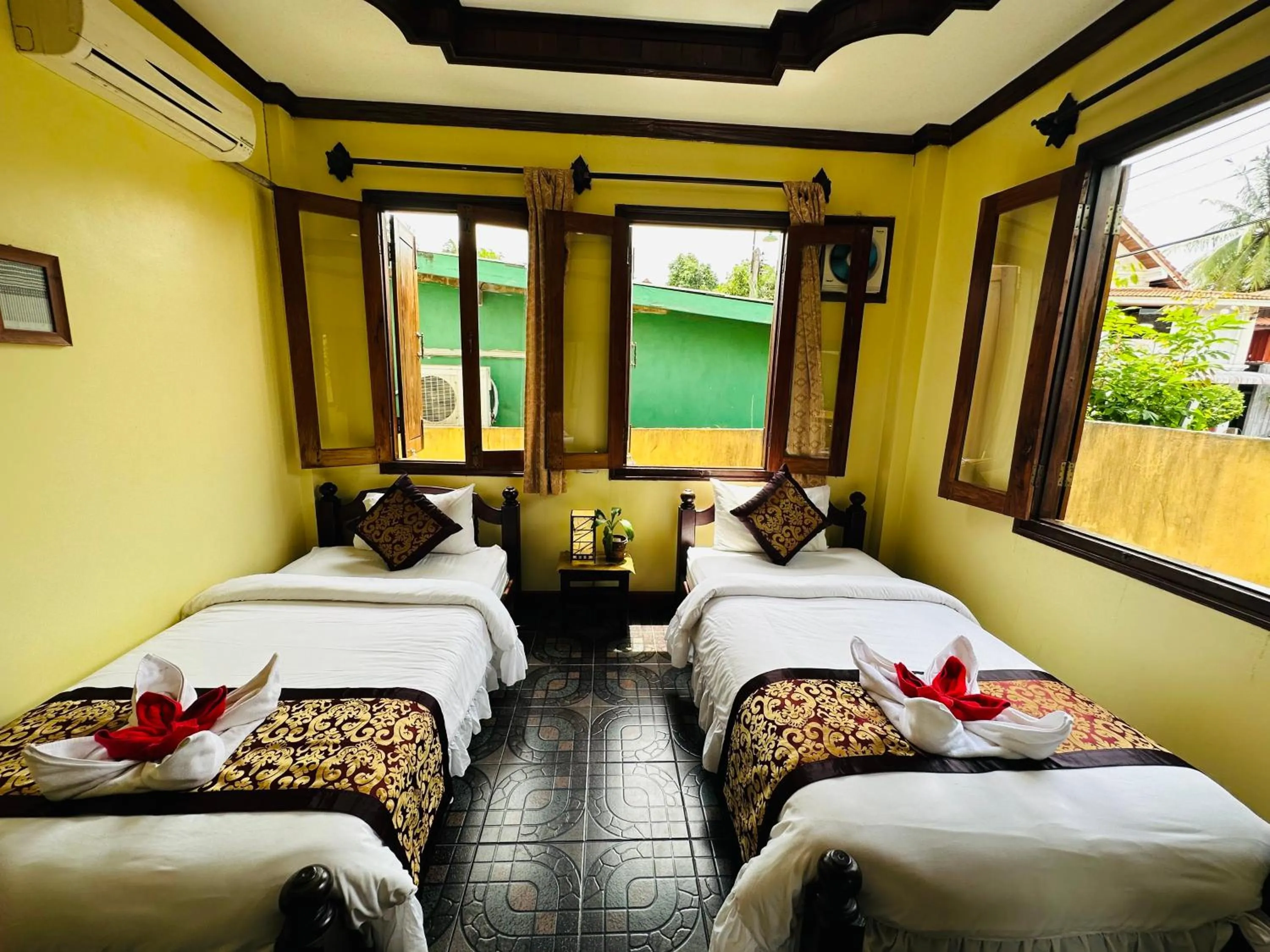 Bed in Visoun Luang Prabang Hotel