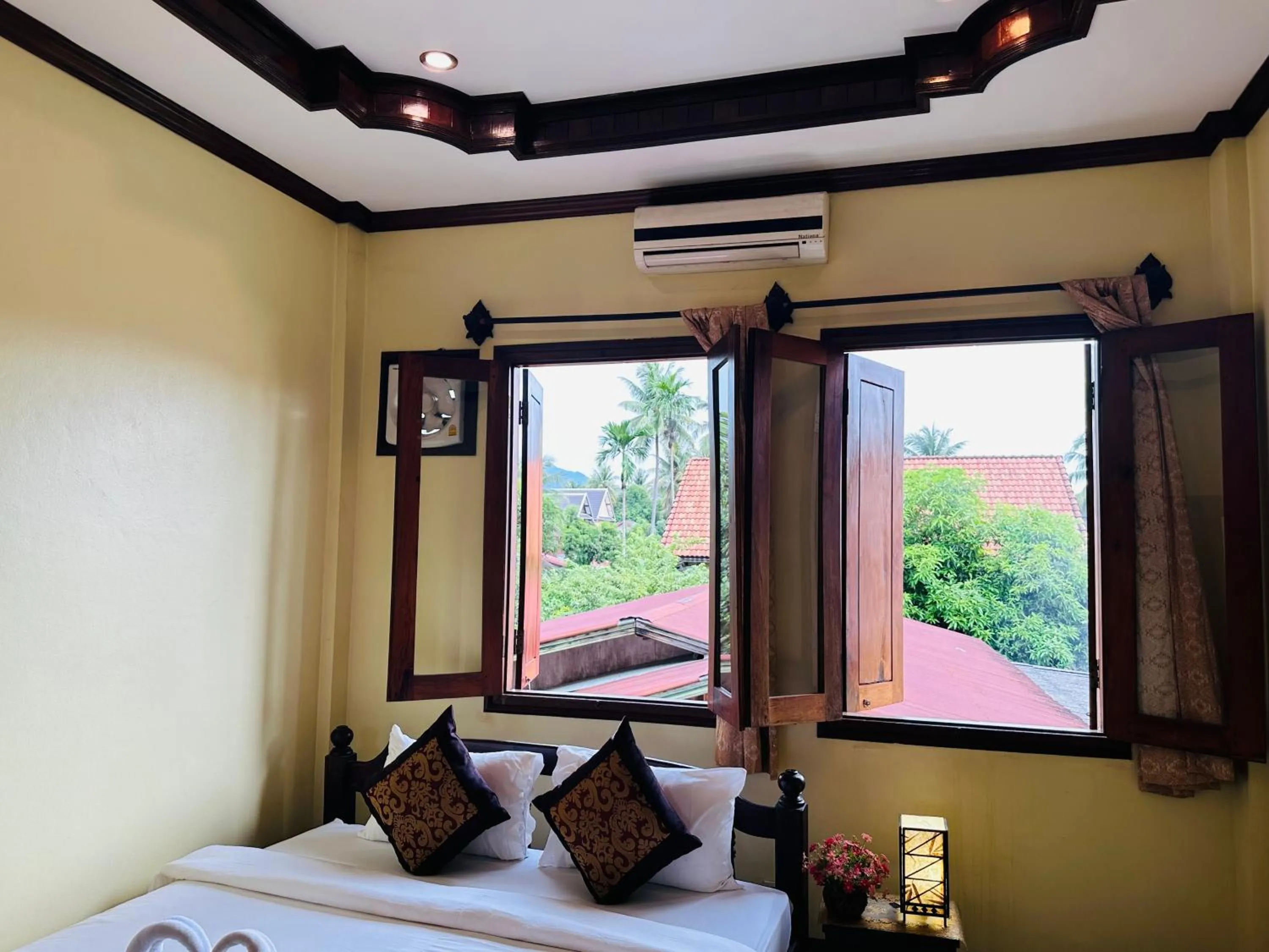 Bed in Visoun Luang Prabang Hotel