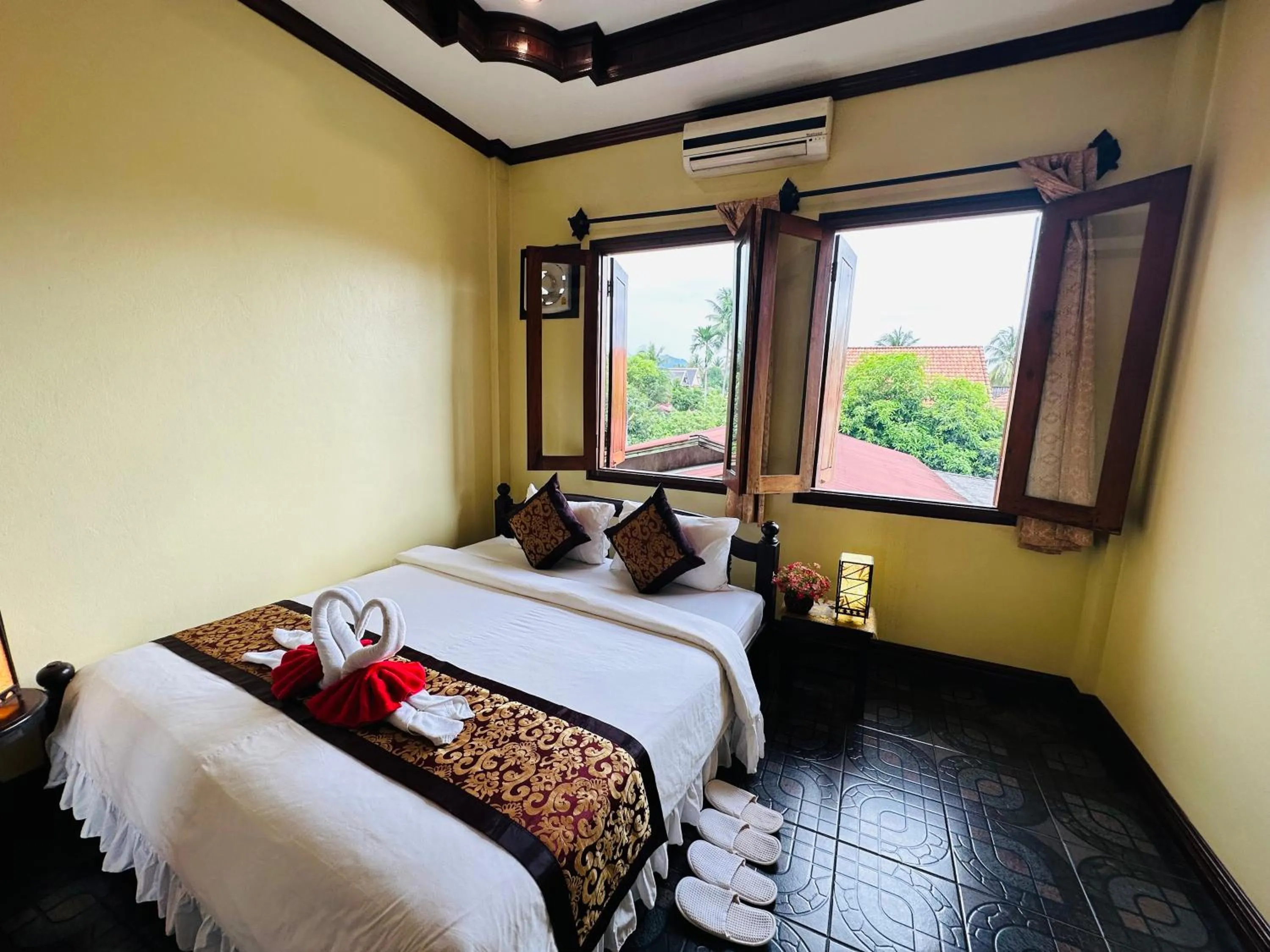 Bed in Visoun Luang Prabang Hotel