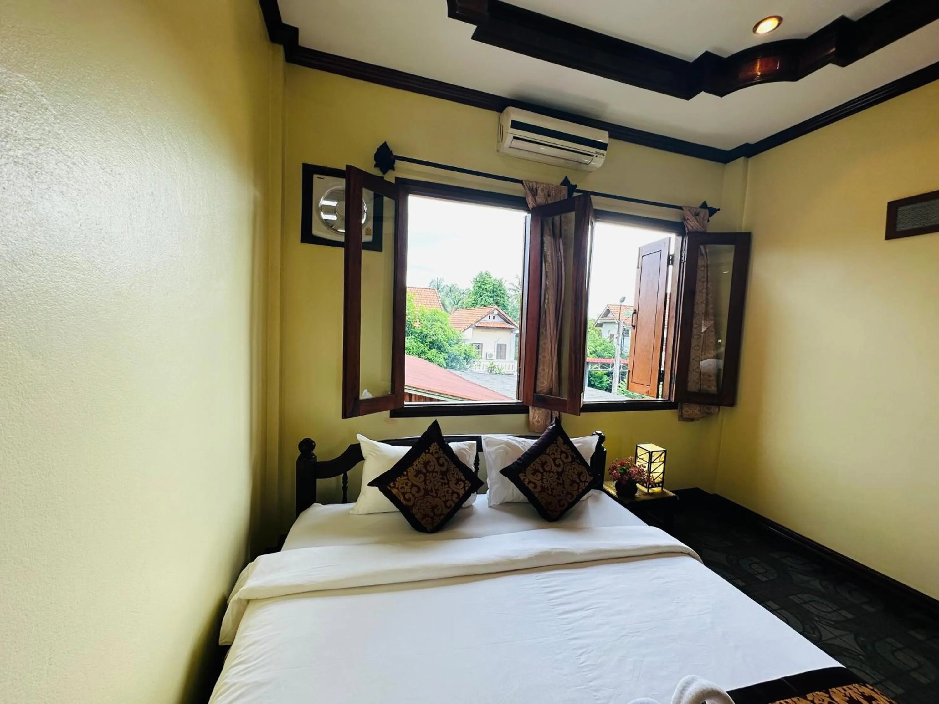 Bed in Visoun Luang Prabang Hotel