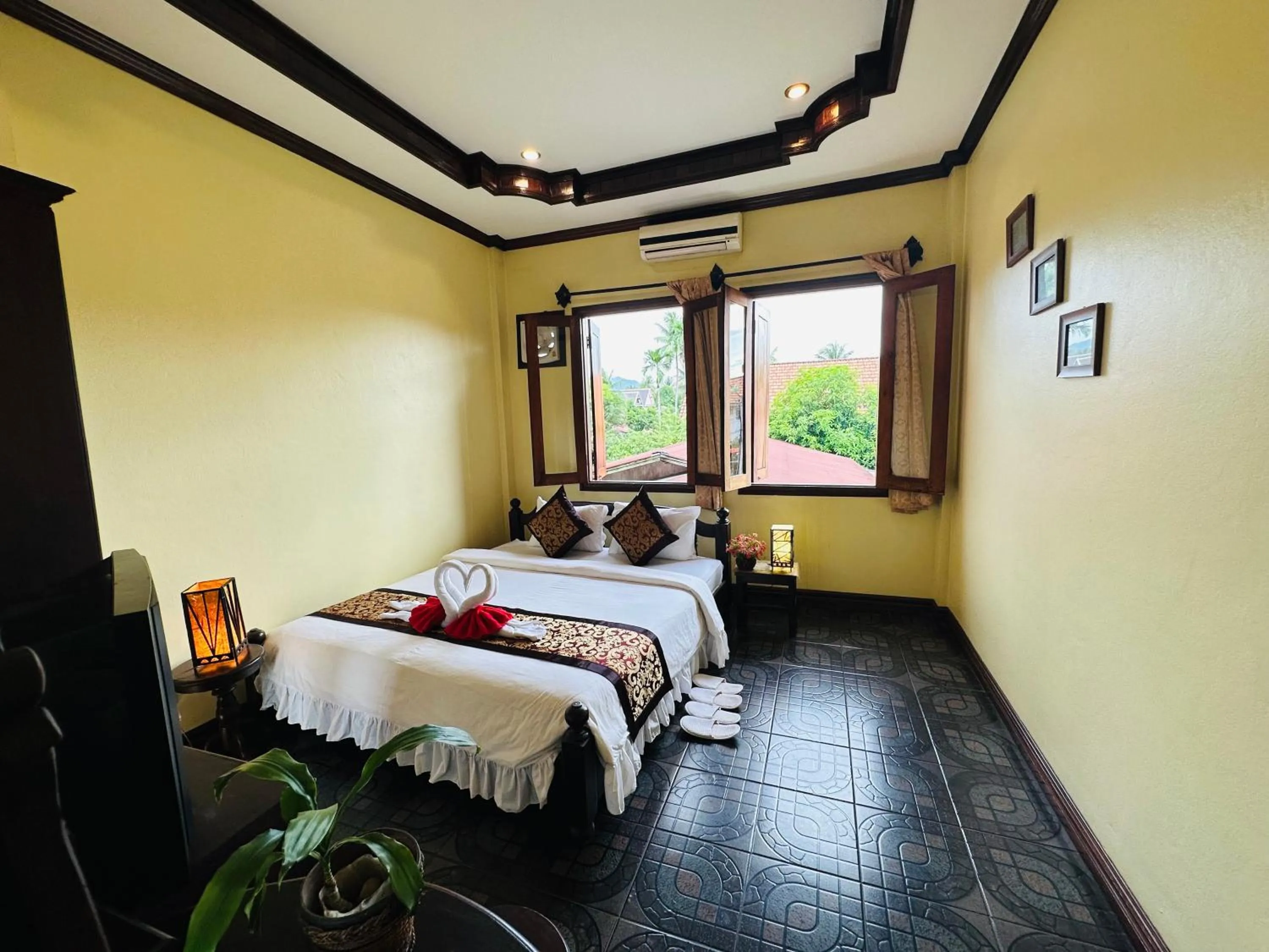 Bed in Visoun Luang Prabang Hotel