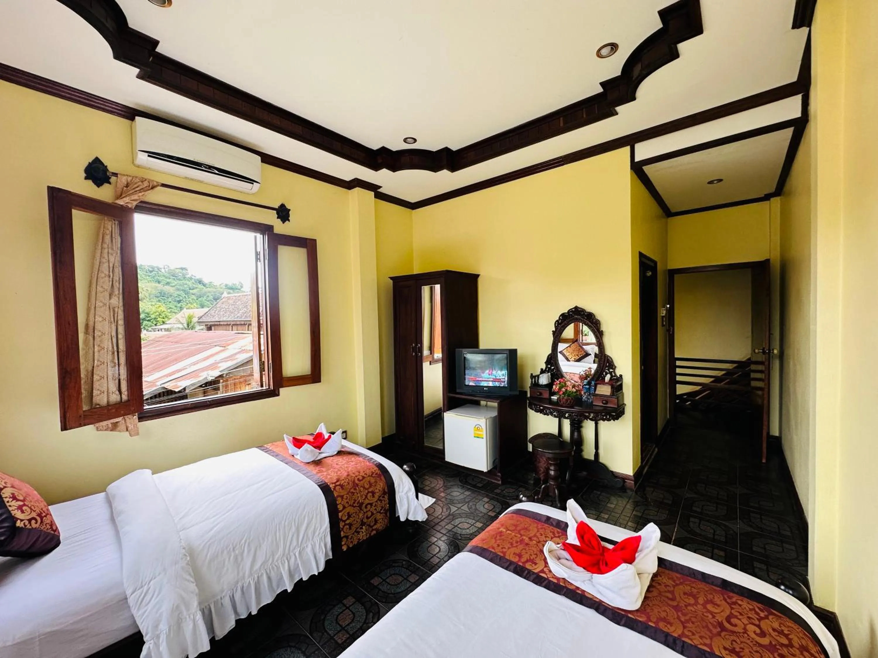 Bed in Visoun Luang Prabang Hotel