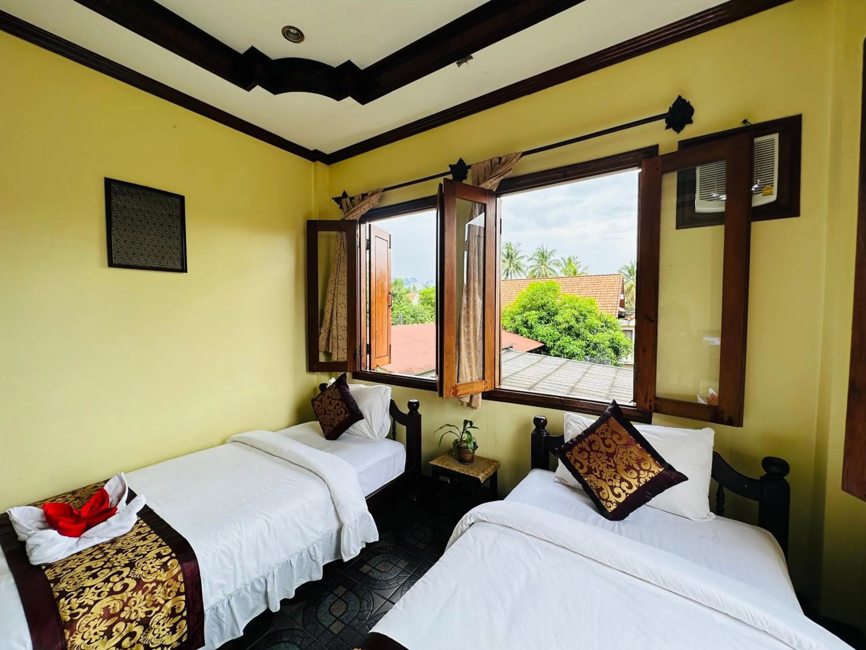 Bed in Visoun Luang Prabang Hotel