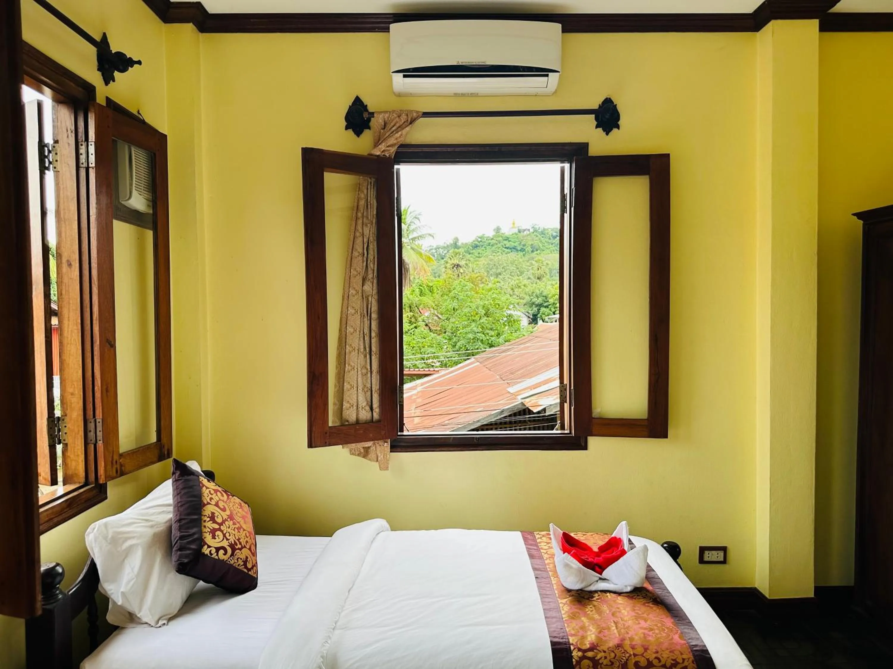 Bed in Visoun Luang Prabang Hotel