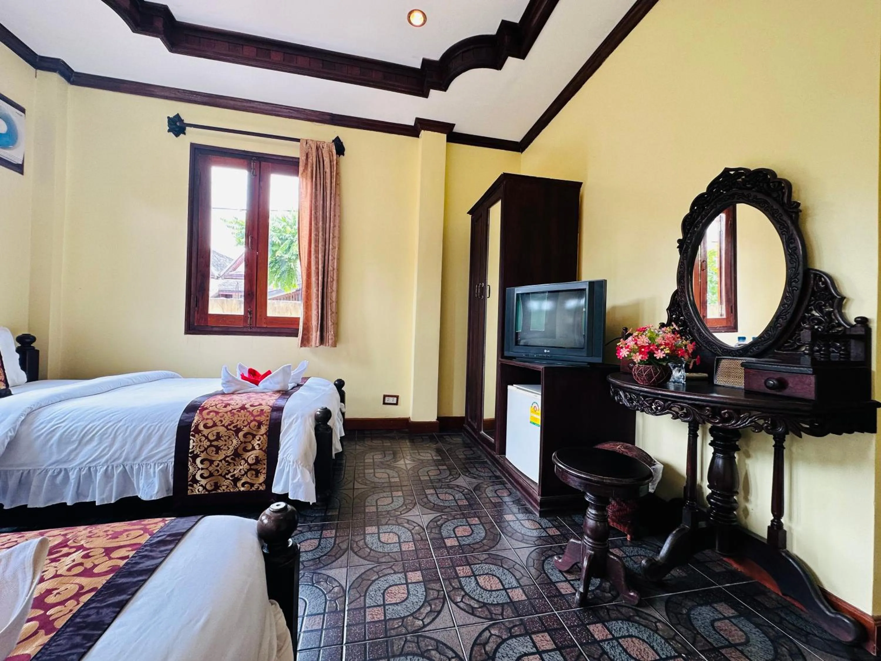 Communal lounge/ TV room, Bed in Visoun Luang Prabang Hotel