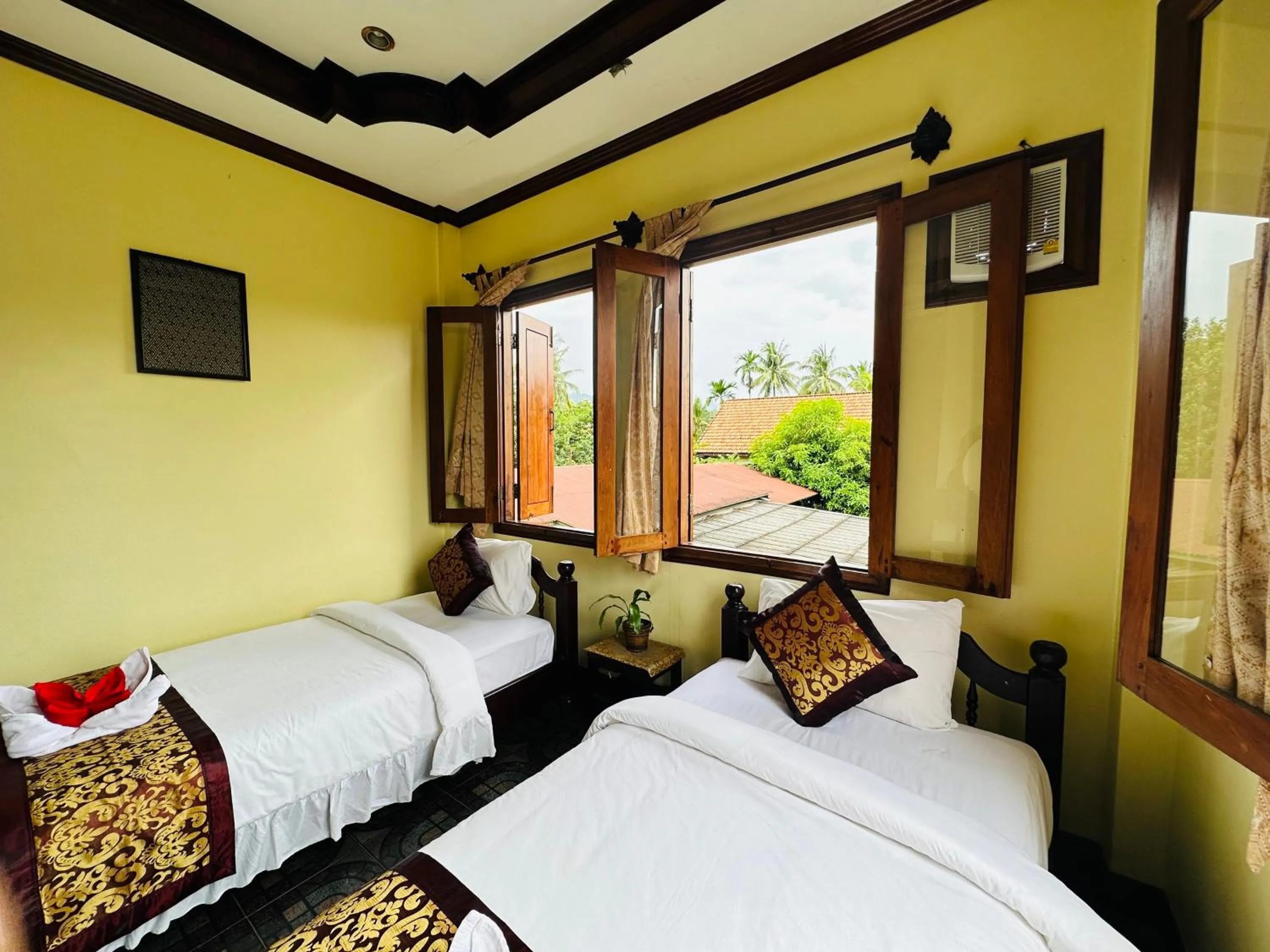 Bed in Visoun Luang Prabang Hotel