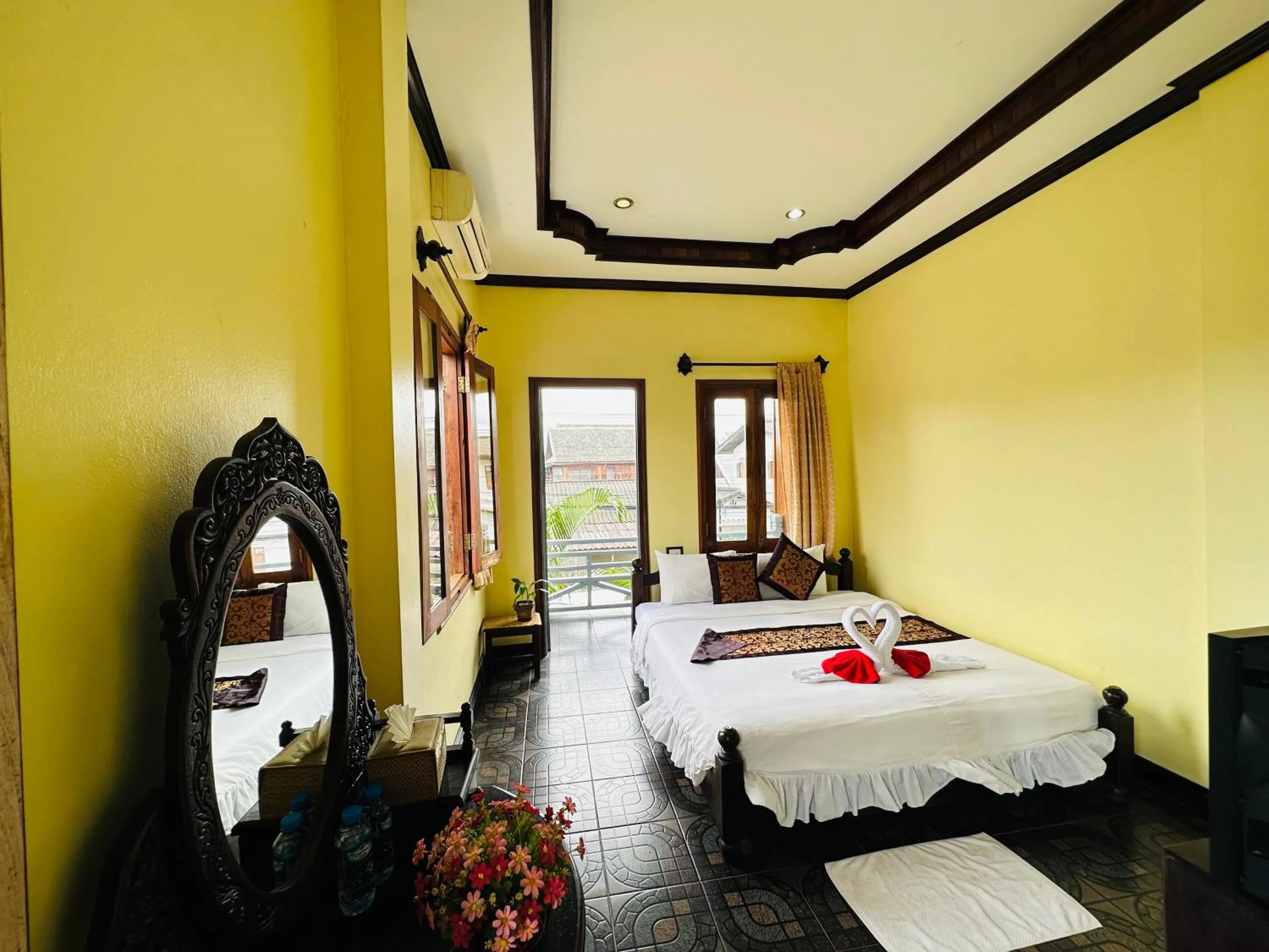 Bed in Visoun Luang Prabang Hotel