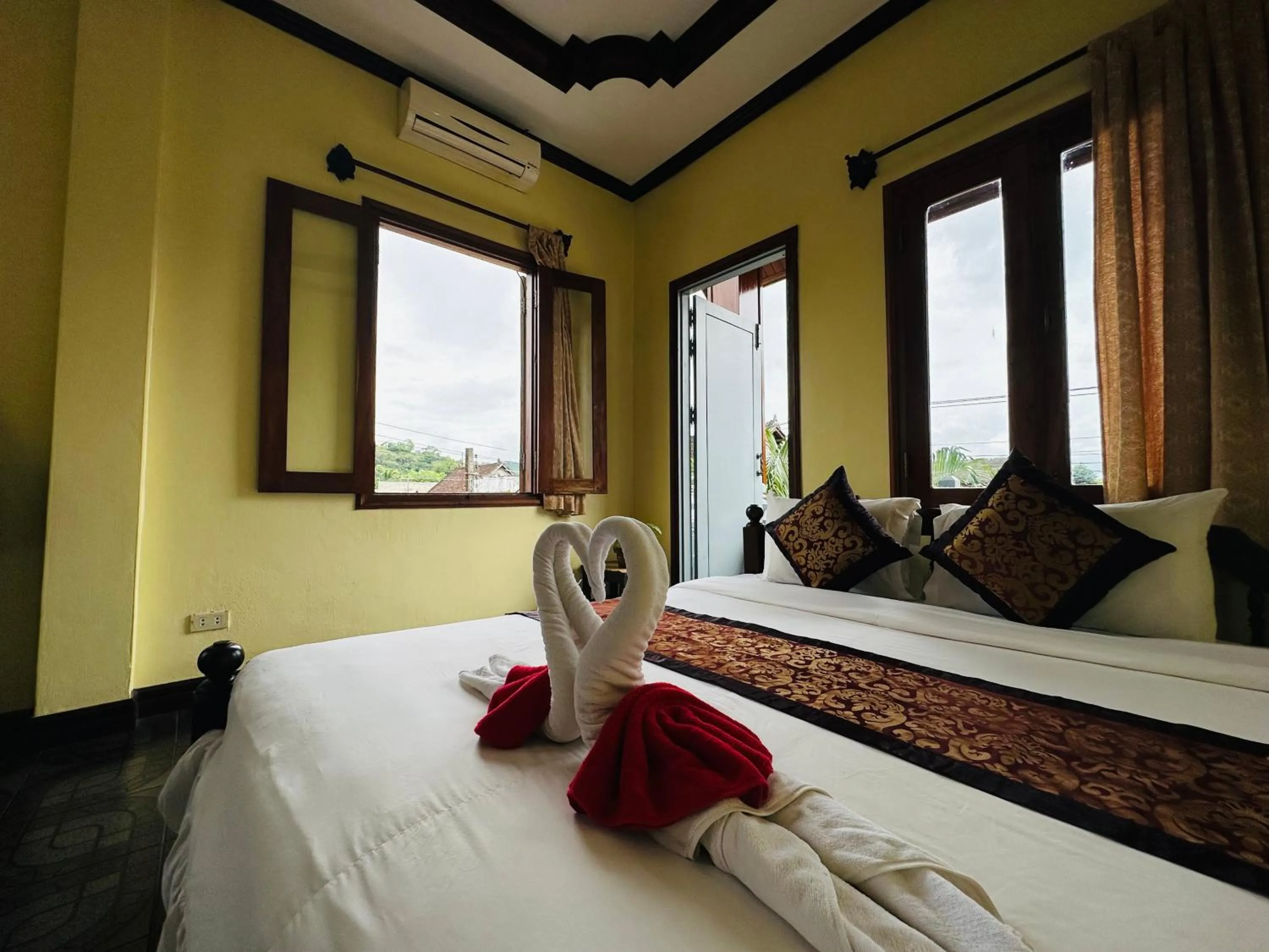 Bed in Visoun Luang Prabang Hotel