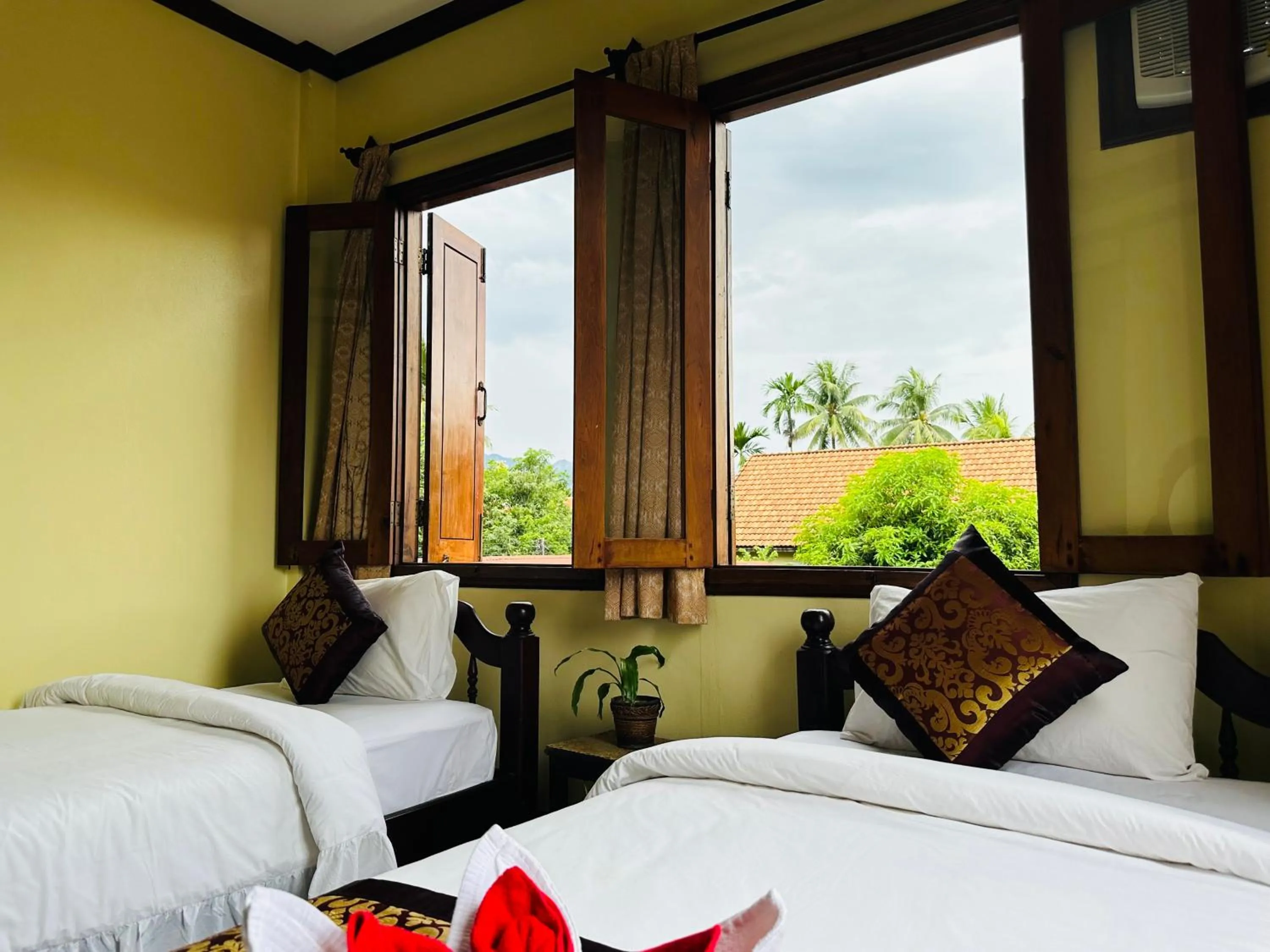 Bed in Visoun Luang Prabang Hotel