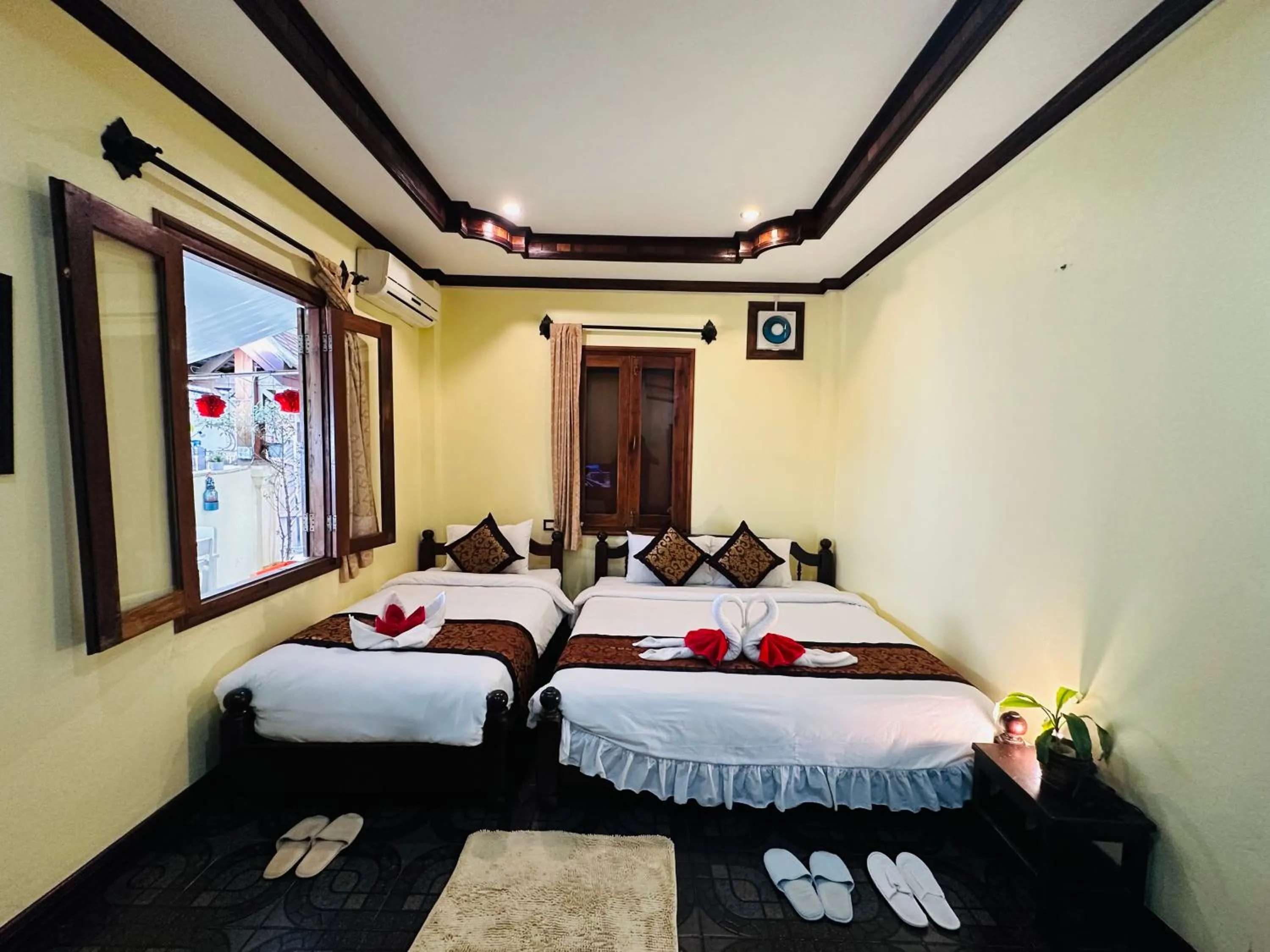 Bed in Visoun Luang Prabang Hotel