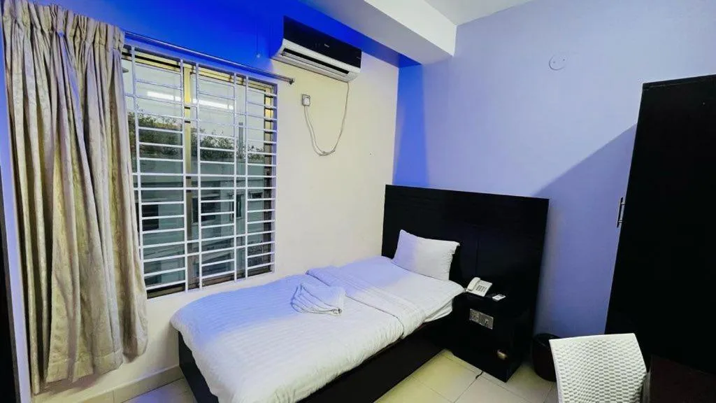 Bed in Hotel Royal Palm