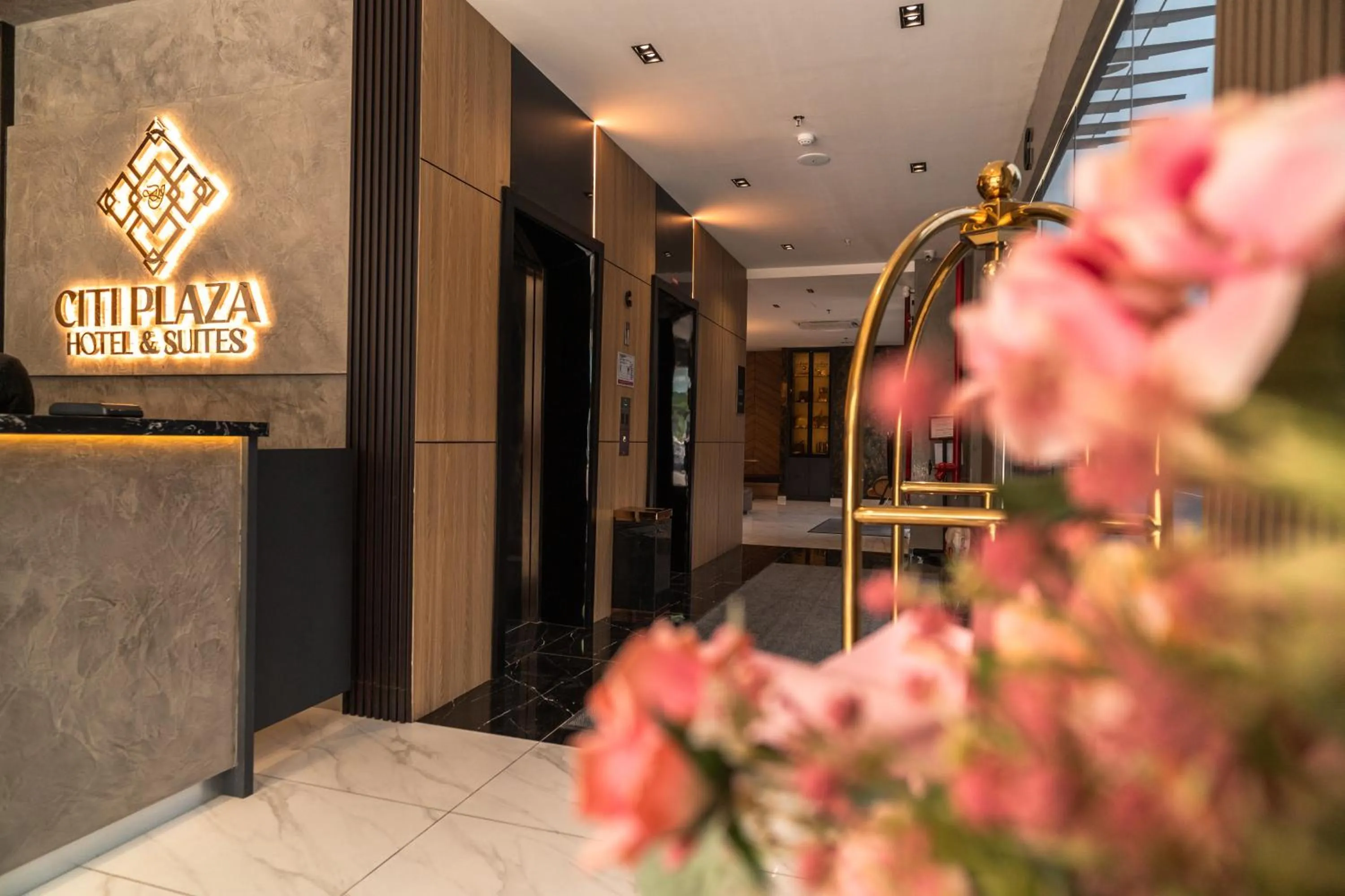 Property logo or sign in DJ Citi Plaza Hotel & Suites