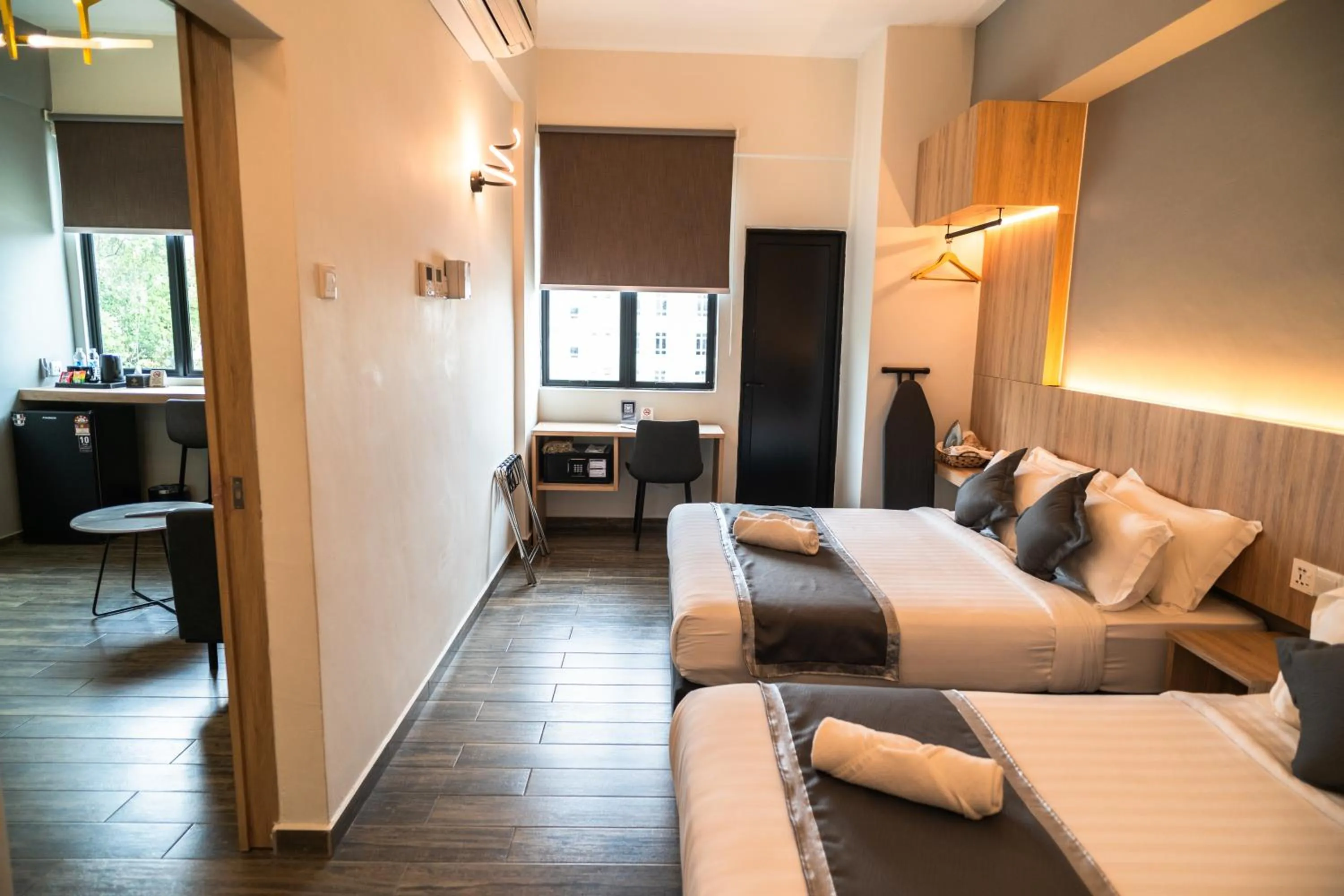 Bed in DJ Citi Plaza Hotel & Suites