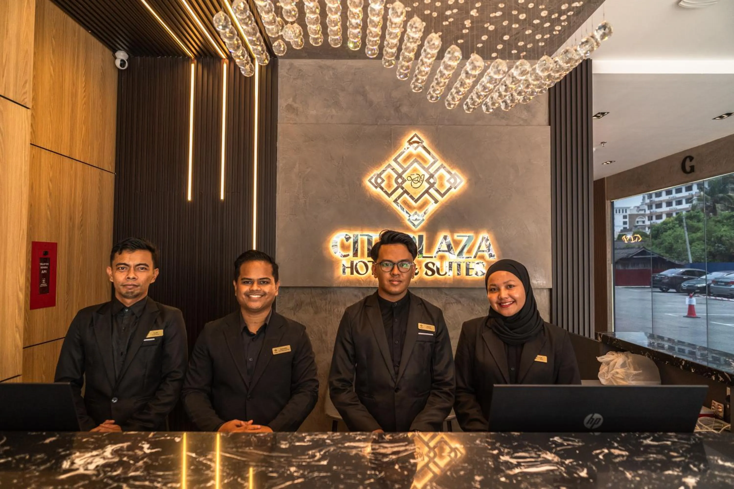 Staff in DJ Citi Plaza Hotel & Suites