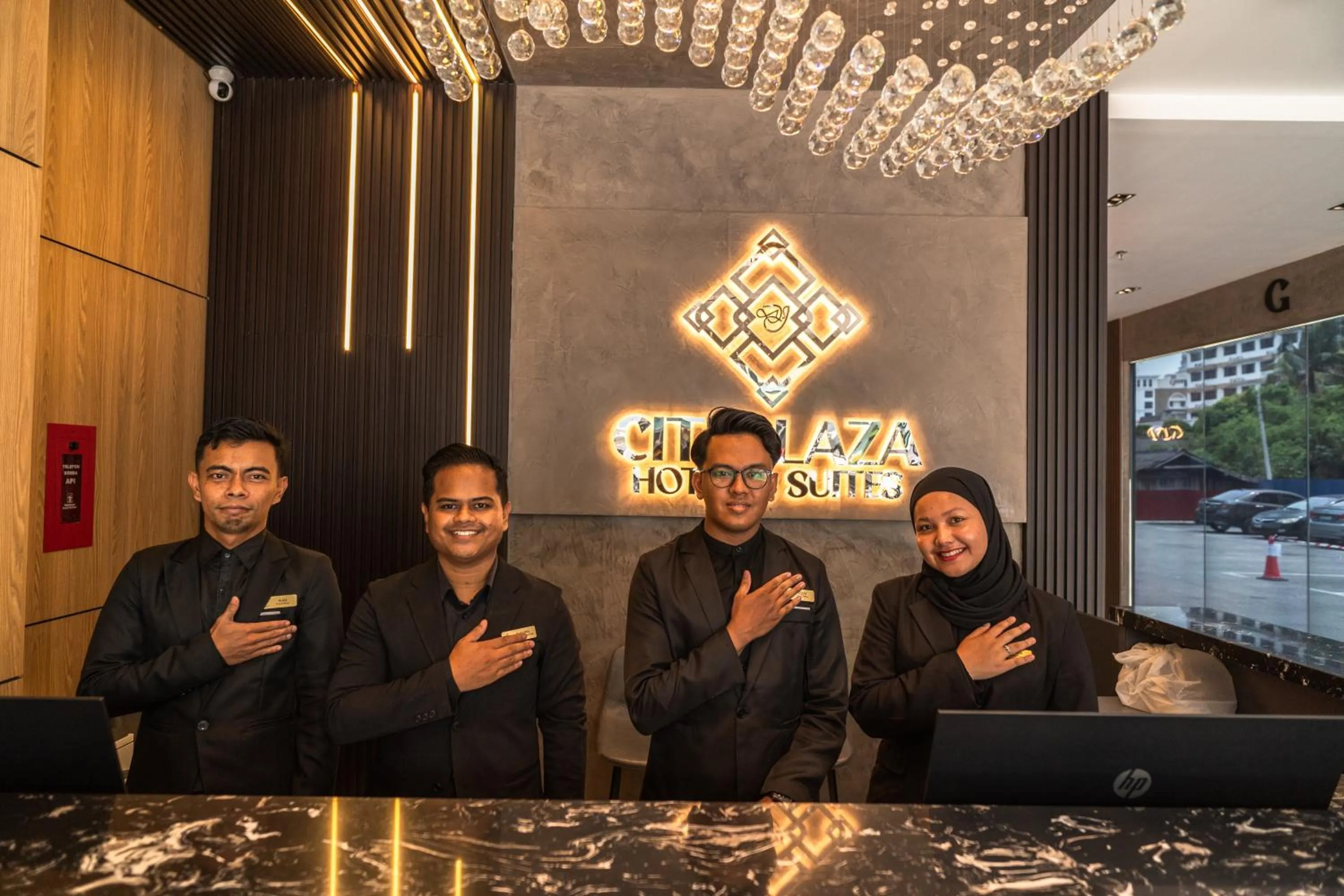 Staff in DJ Citi Plaza Hotel & Suites