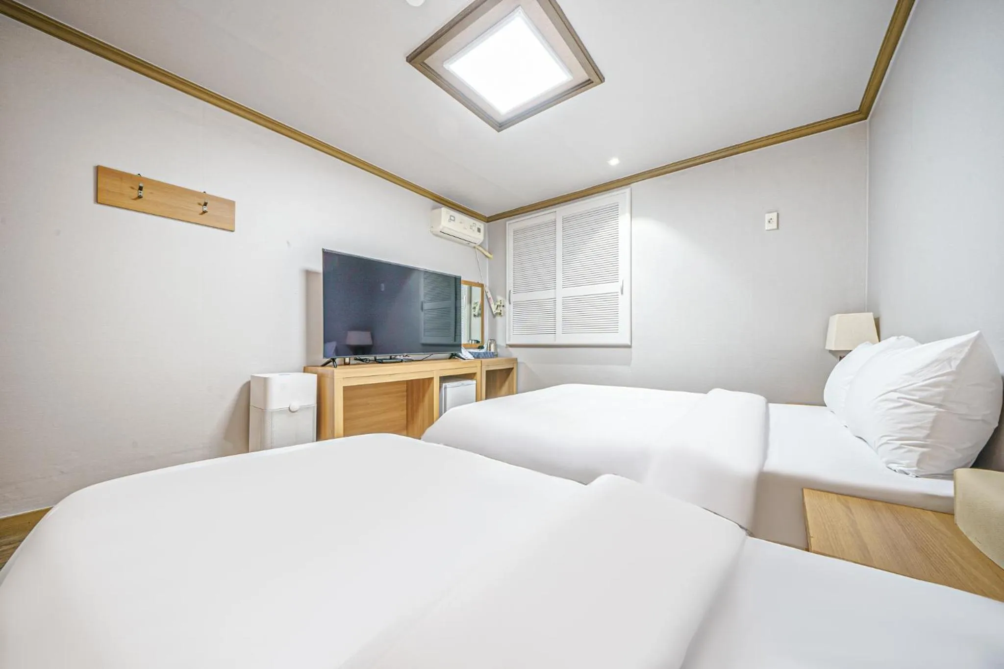 Bed in Buan Tree California Hotel