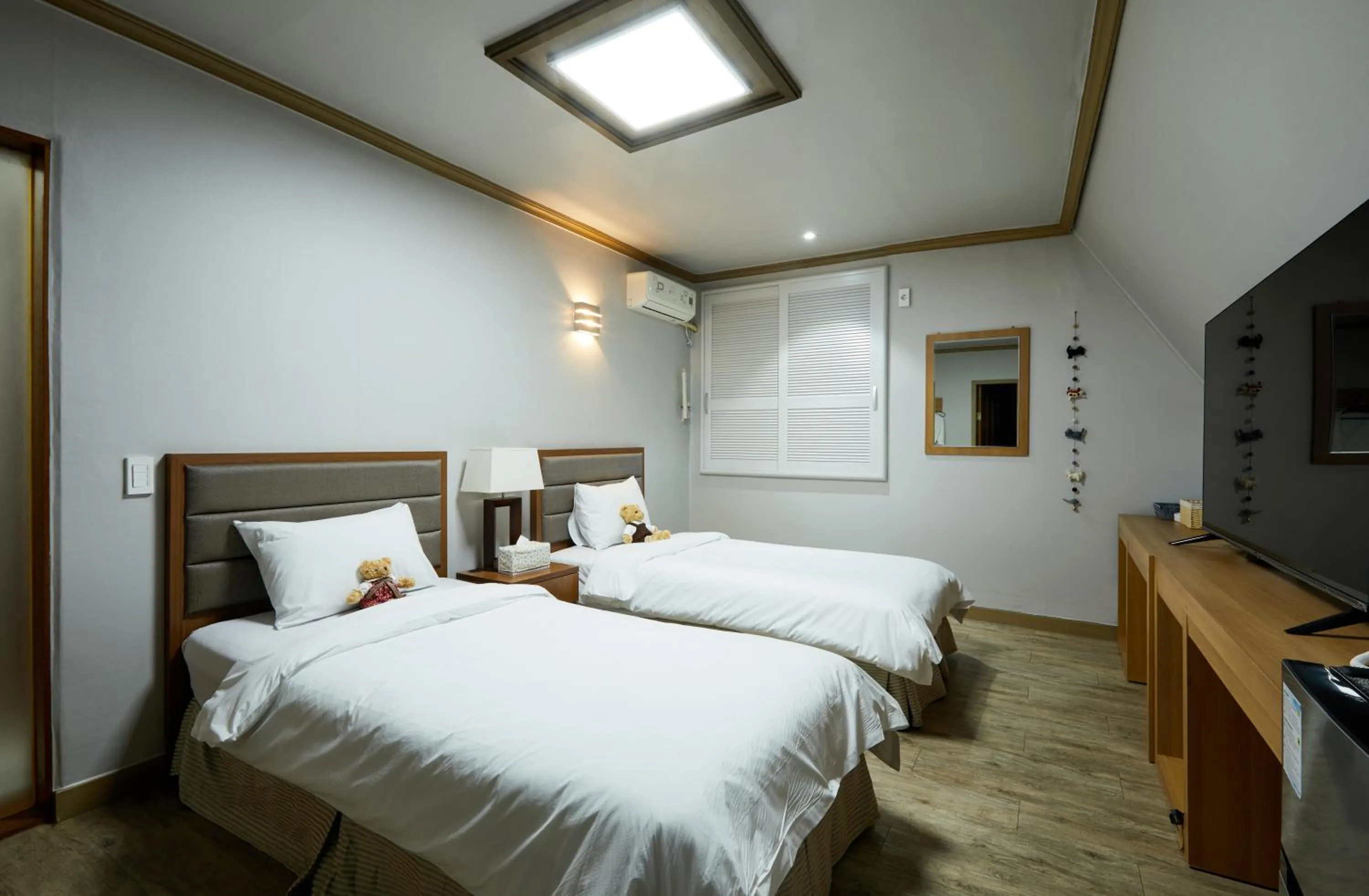 Bed in Buan Tree California Hotel